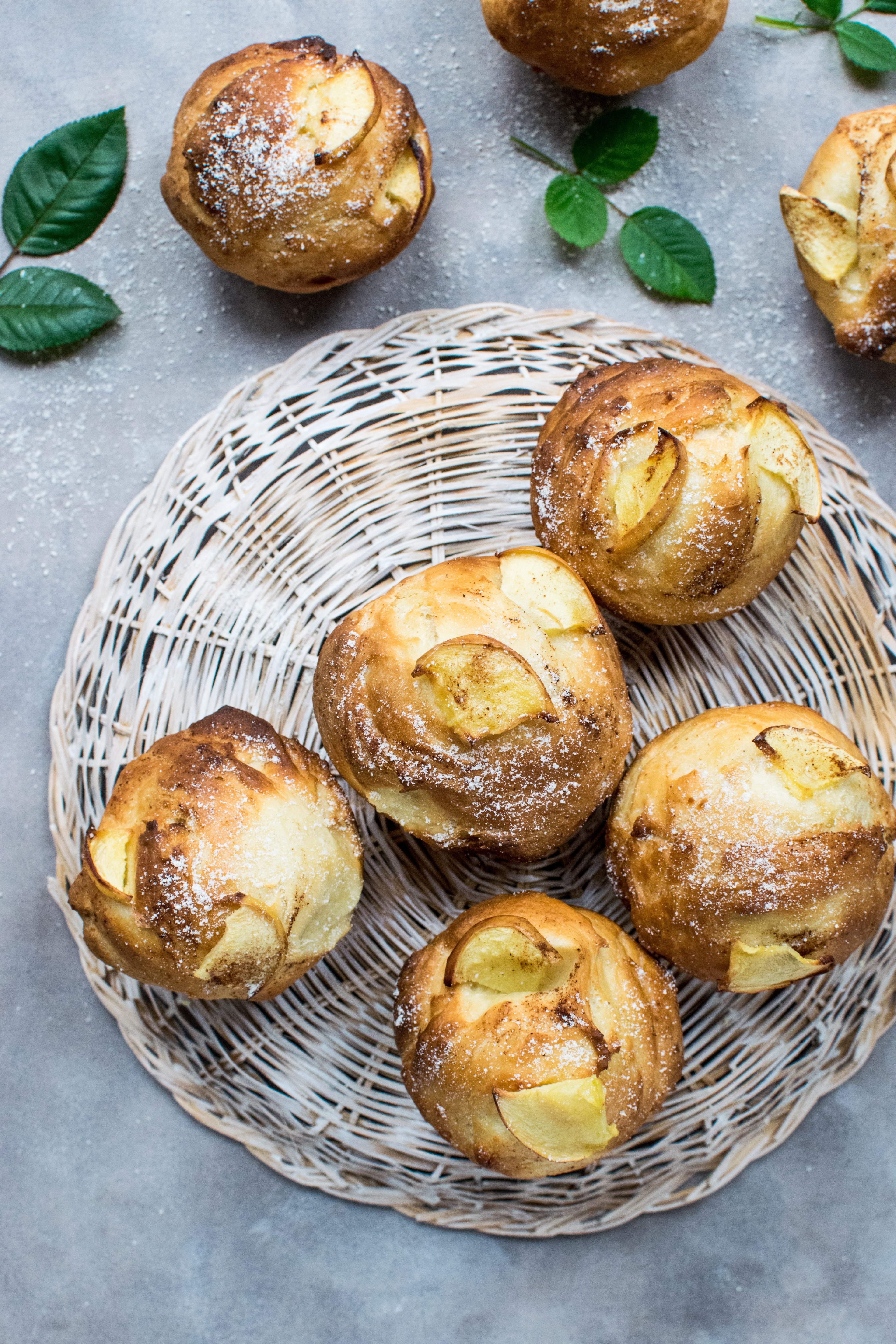 bread rolls on a weaved basket next to some leaves and powdered in flour, yeast muffins with apple 4k, Phone HD Wallpaper
