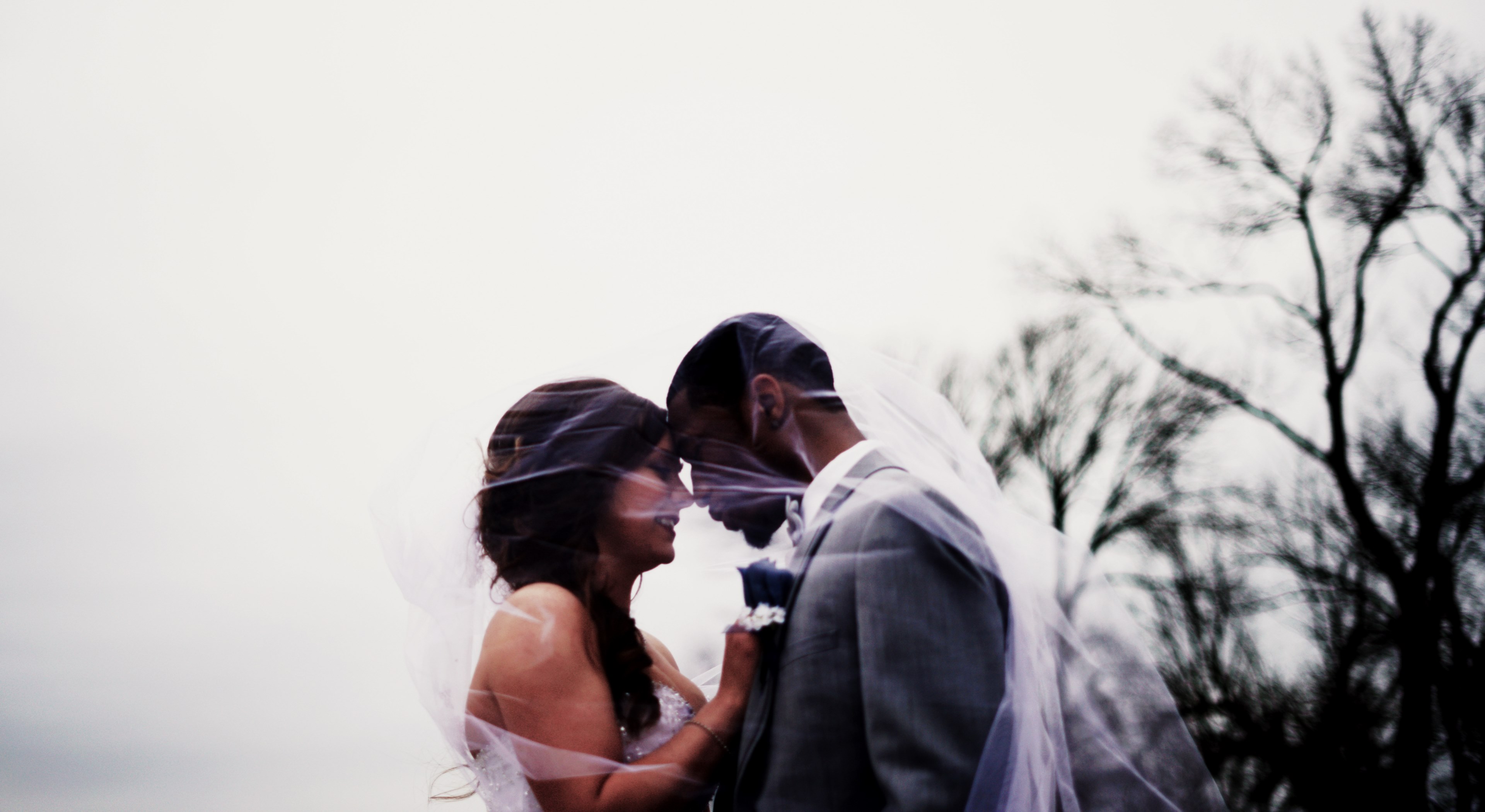 bride and groom stand under the veil outside, making smiles together 4k, HD Wallpaper