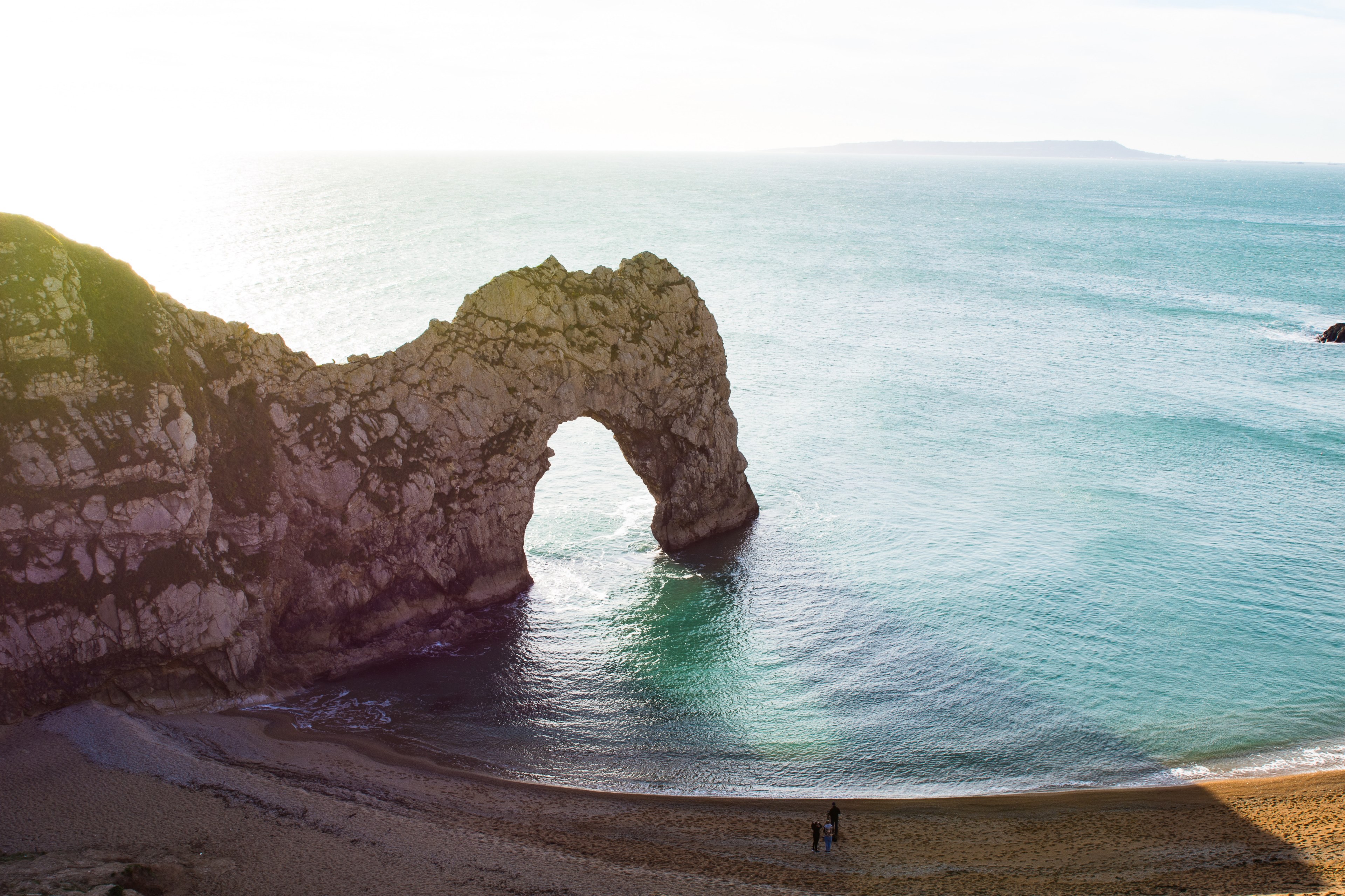 view of the rock formation at the sand beach in durdle door, durdle door 4k, HD Wallpaper