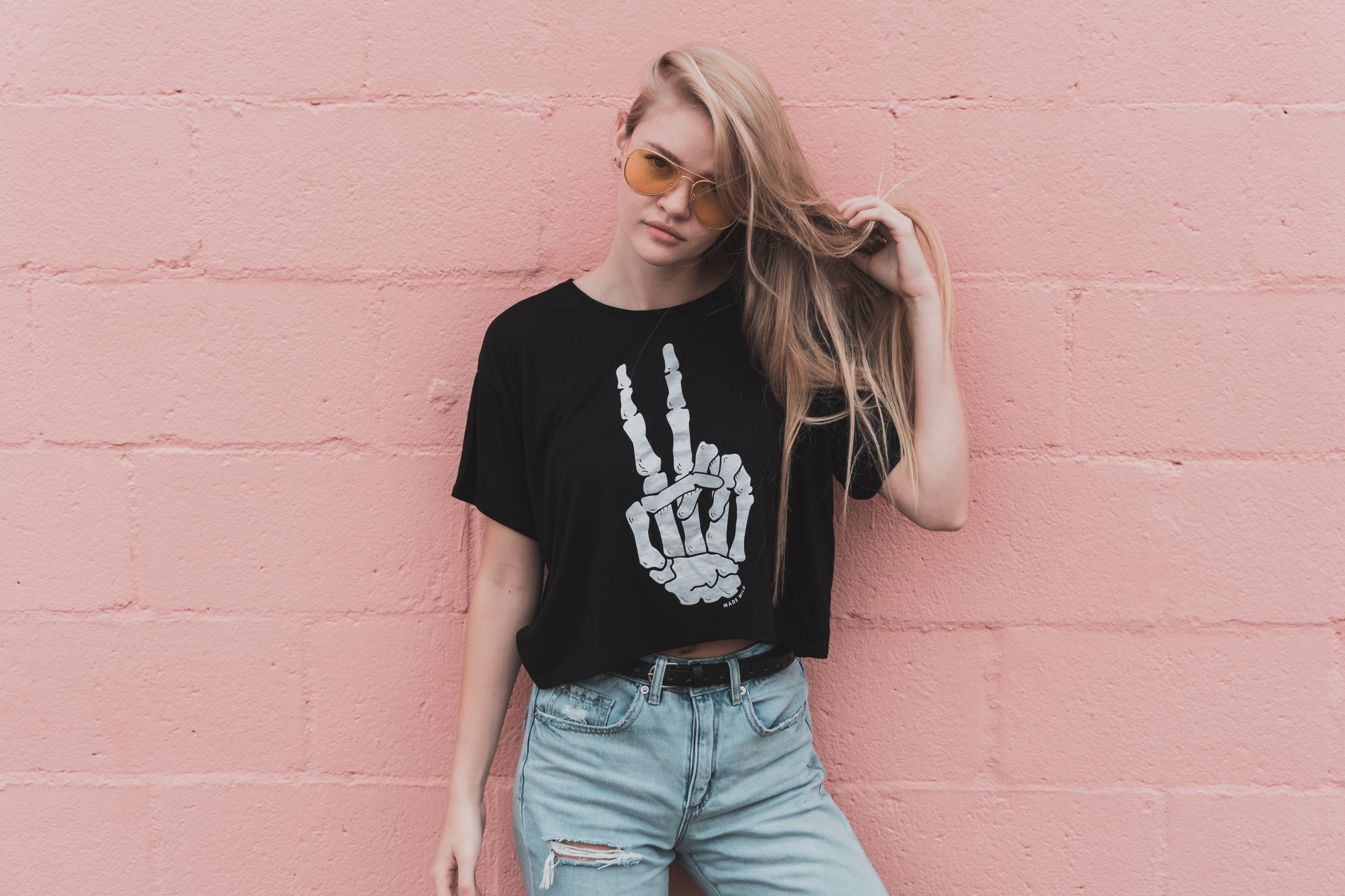 trendy young woman in a skeleton shirt by a pink wall, teen fashion 4k, HD Wallpaper