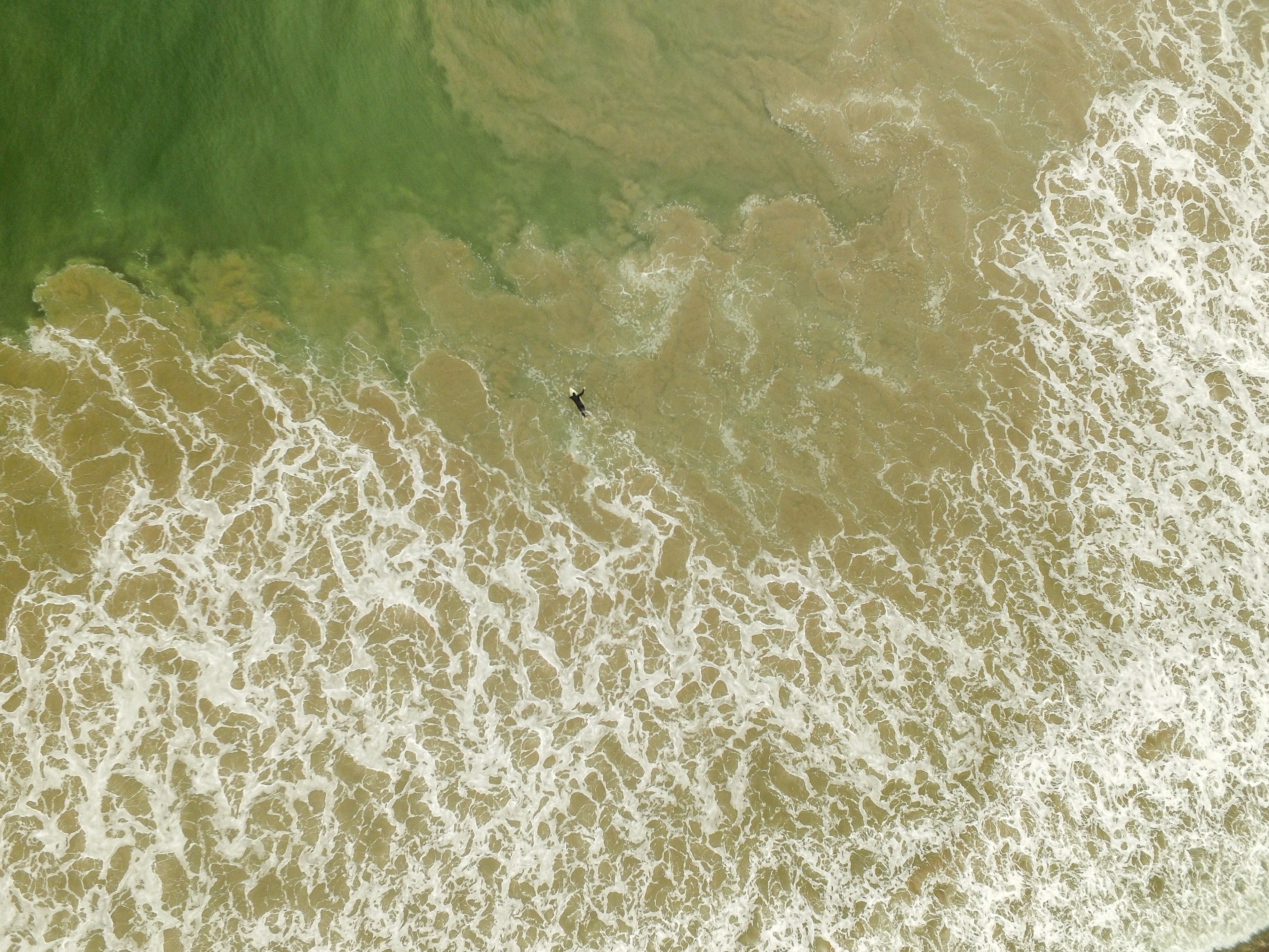 an overhead drone shot of a surfer in a foaming ocean at san clemente, a different perspective 4k, HD Wallpaper