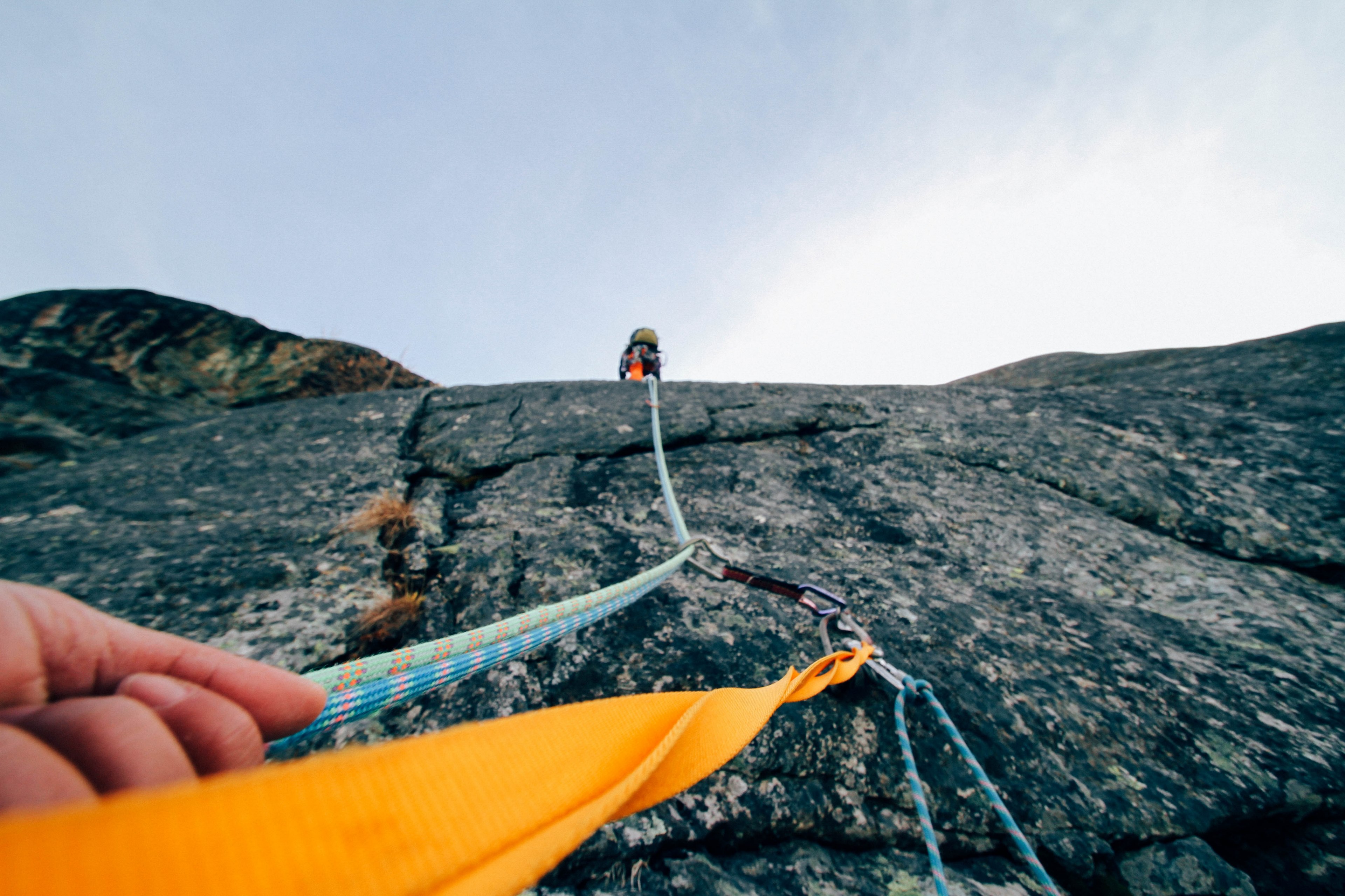 a person holding onto a rope while climbing up a mountain, _italy 4k, HD Wallpaper