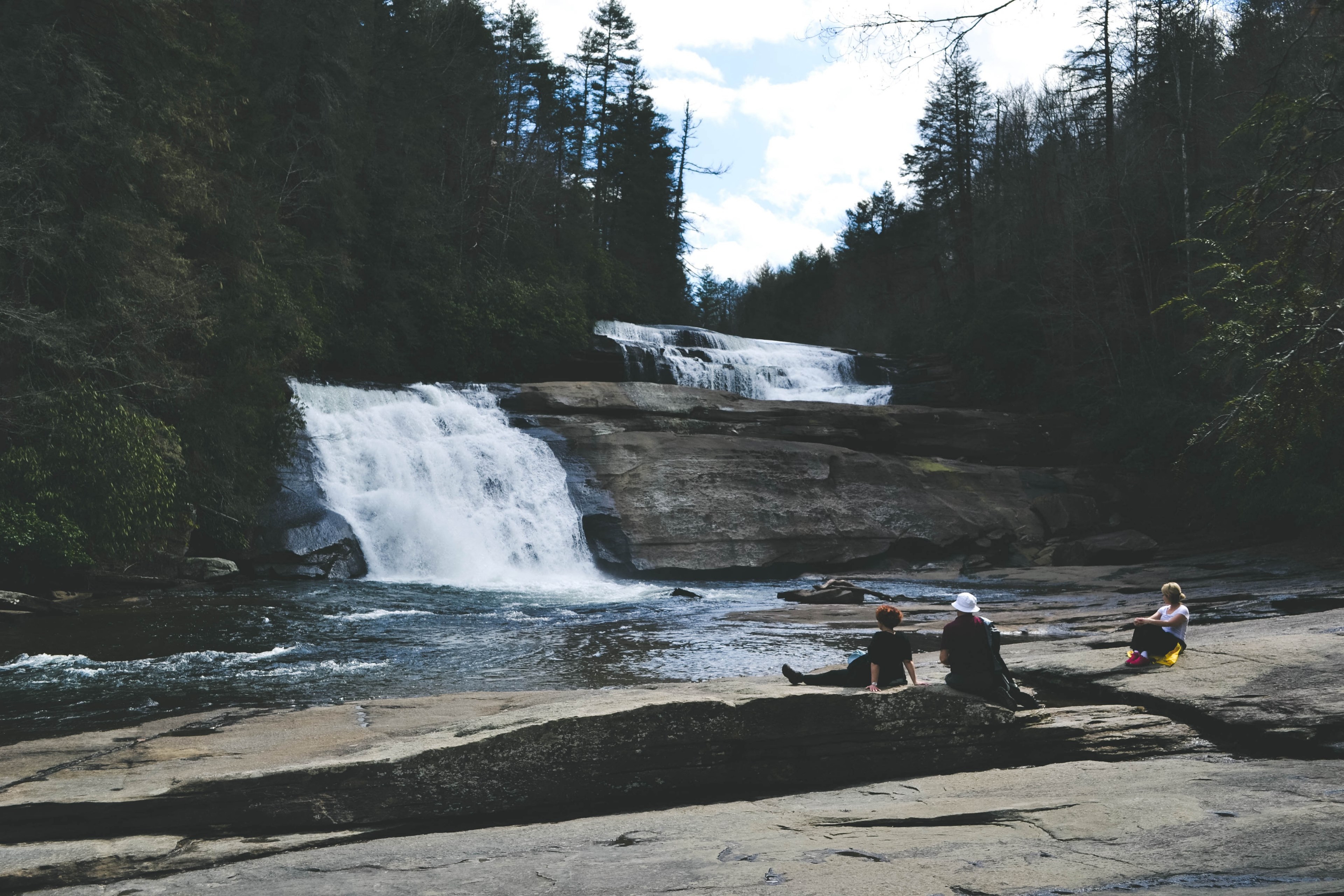 small waterfall and river with evergreen trees and hiker people in spring north carolina, waterfall spring carolina 4k, HD Wallpaper