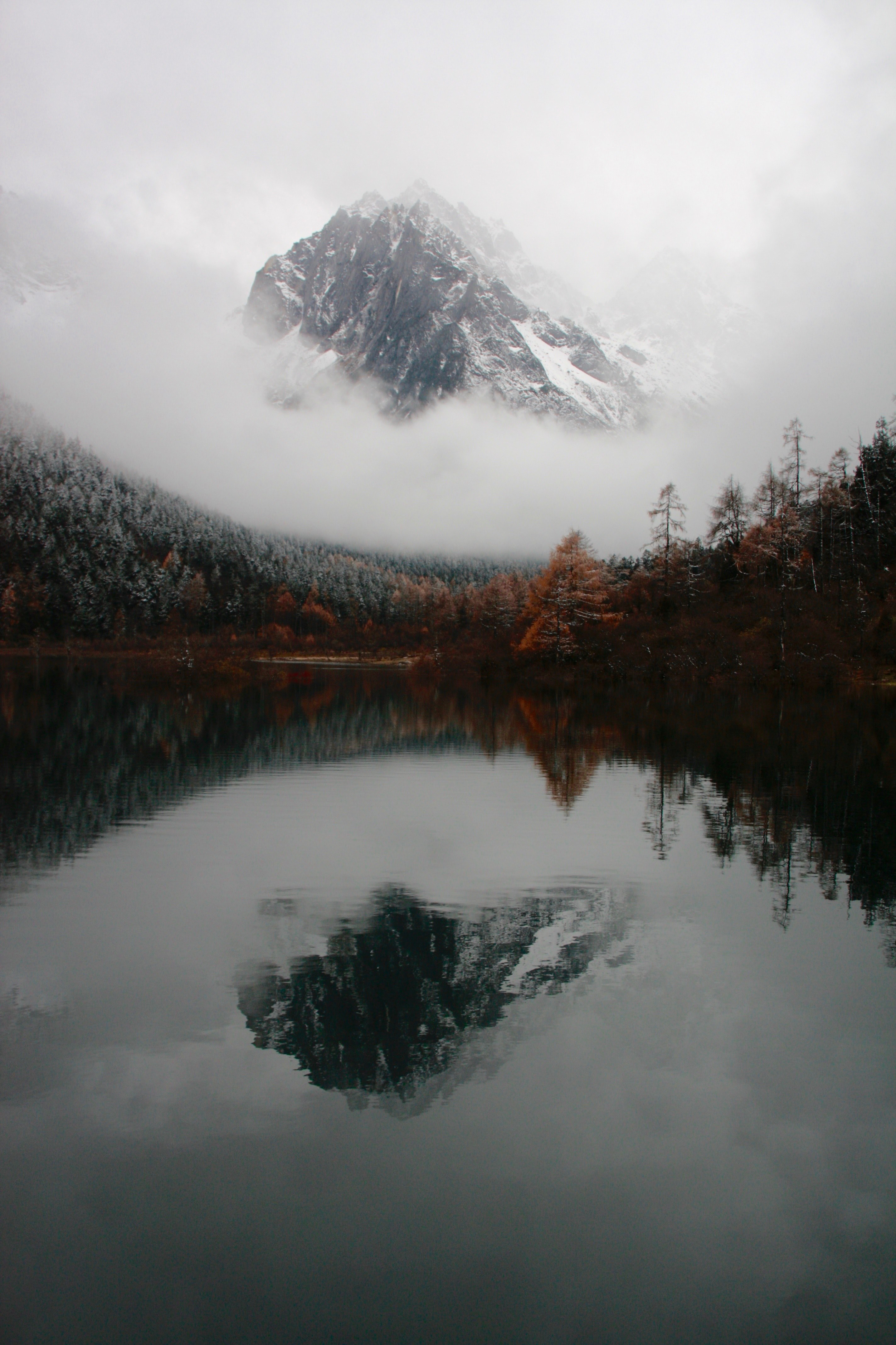 mountain peak reflects in calm waters surrounded by autumnal trees, chinas mist mountain 4k, Phone HD Wallpaper