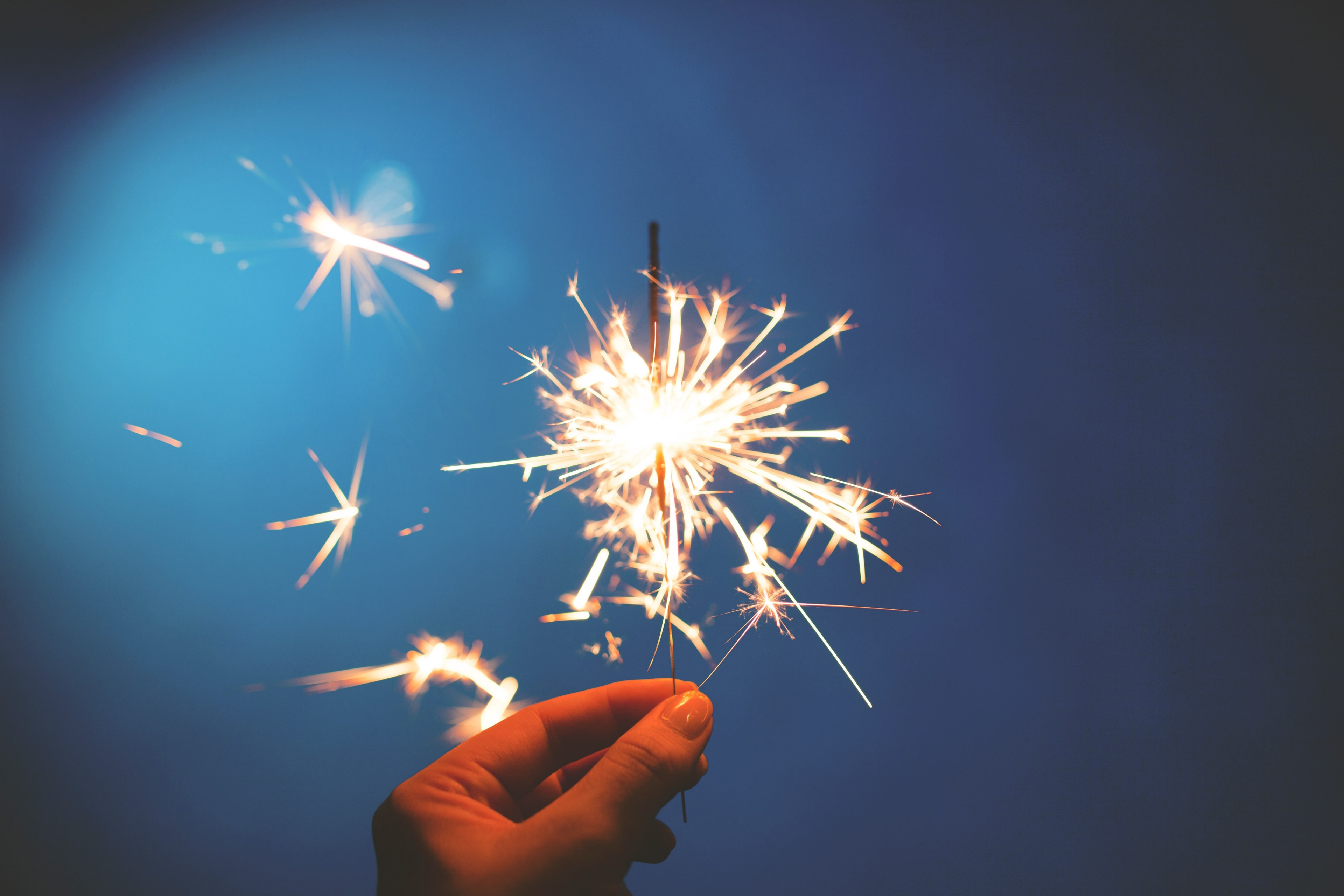 sparkler spark glow and hand 4k, HD Wallpaper