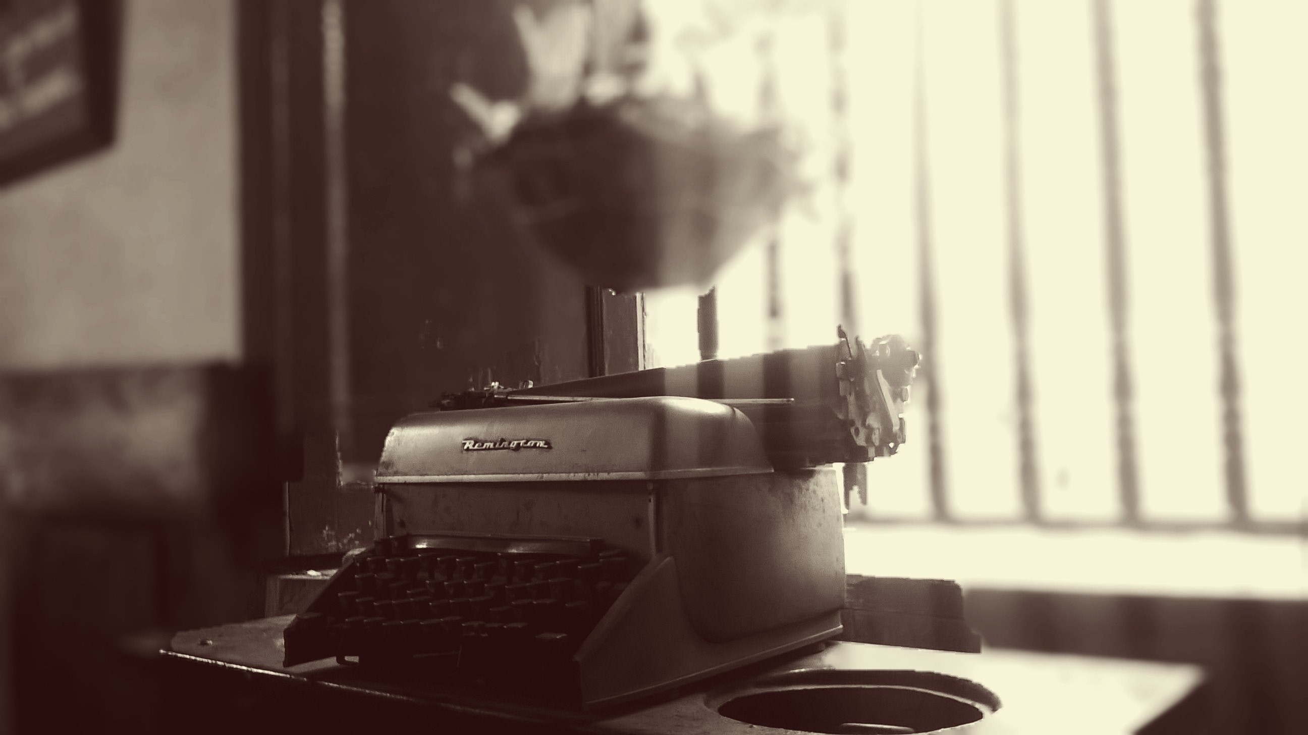 an old antique typewriter sits near a window with soft light coming through, _antique typewriter near window 4k, HD Wallpaper
