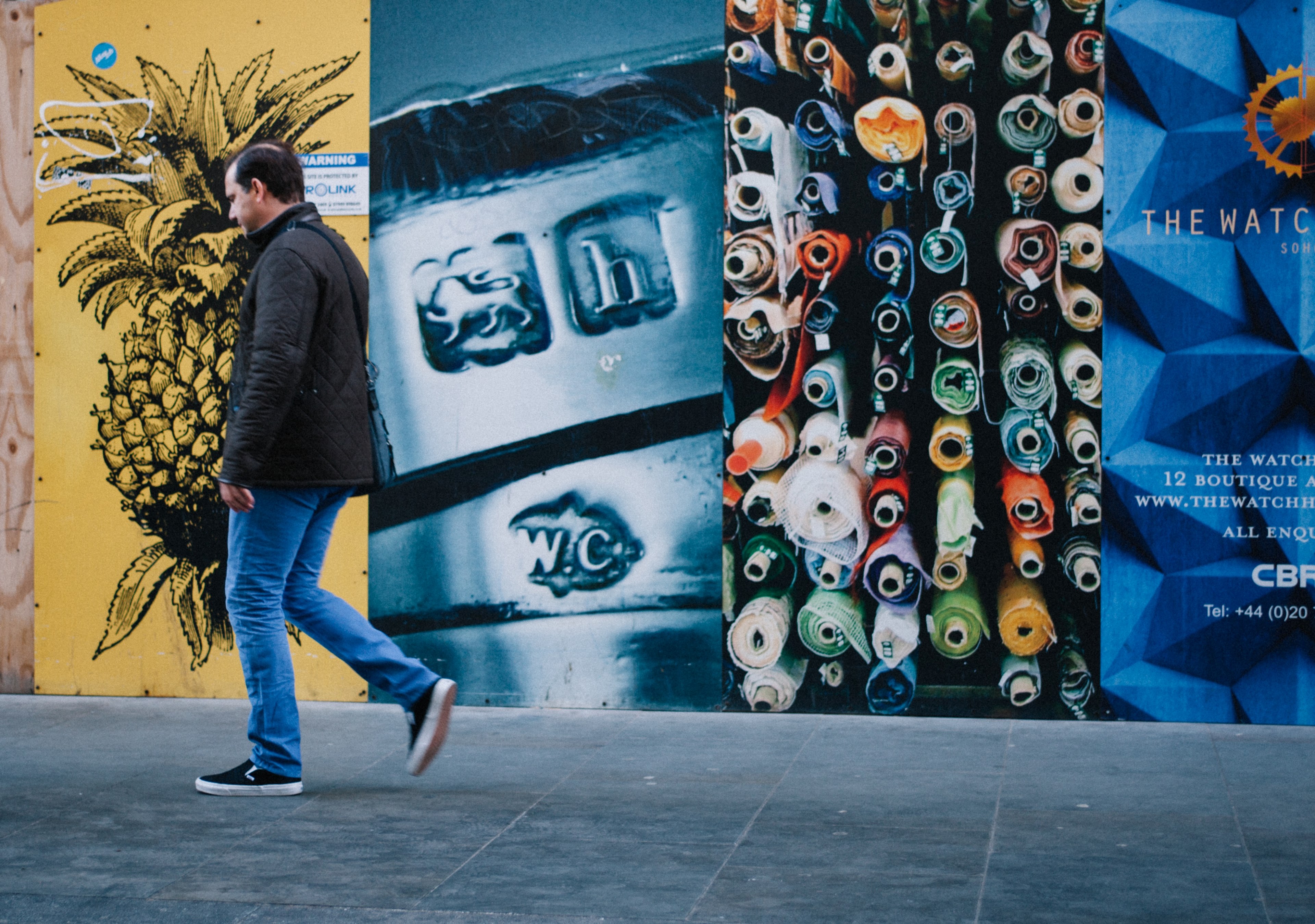 man walking near colorful diverse street art with pineapple in soho, strides of soho 4k, HD Wallpaper
