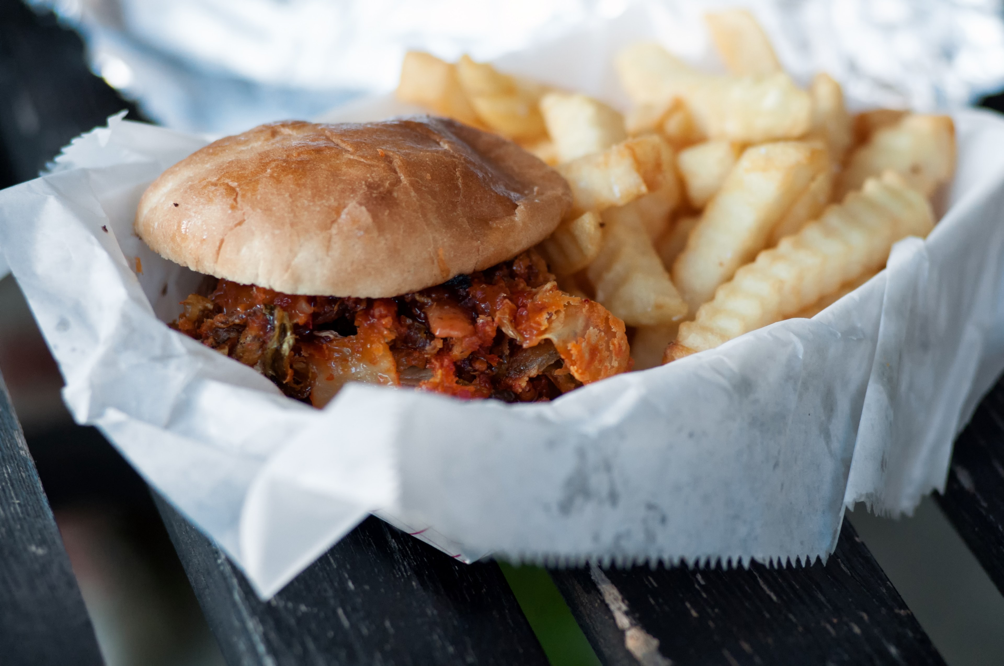 burger on a plain bun with bacon and cheese and a side of french fries in a basket lined with paper, sandwich with fries 4k, HD Wallpaper