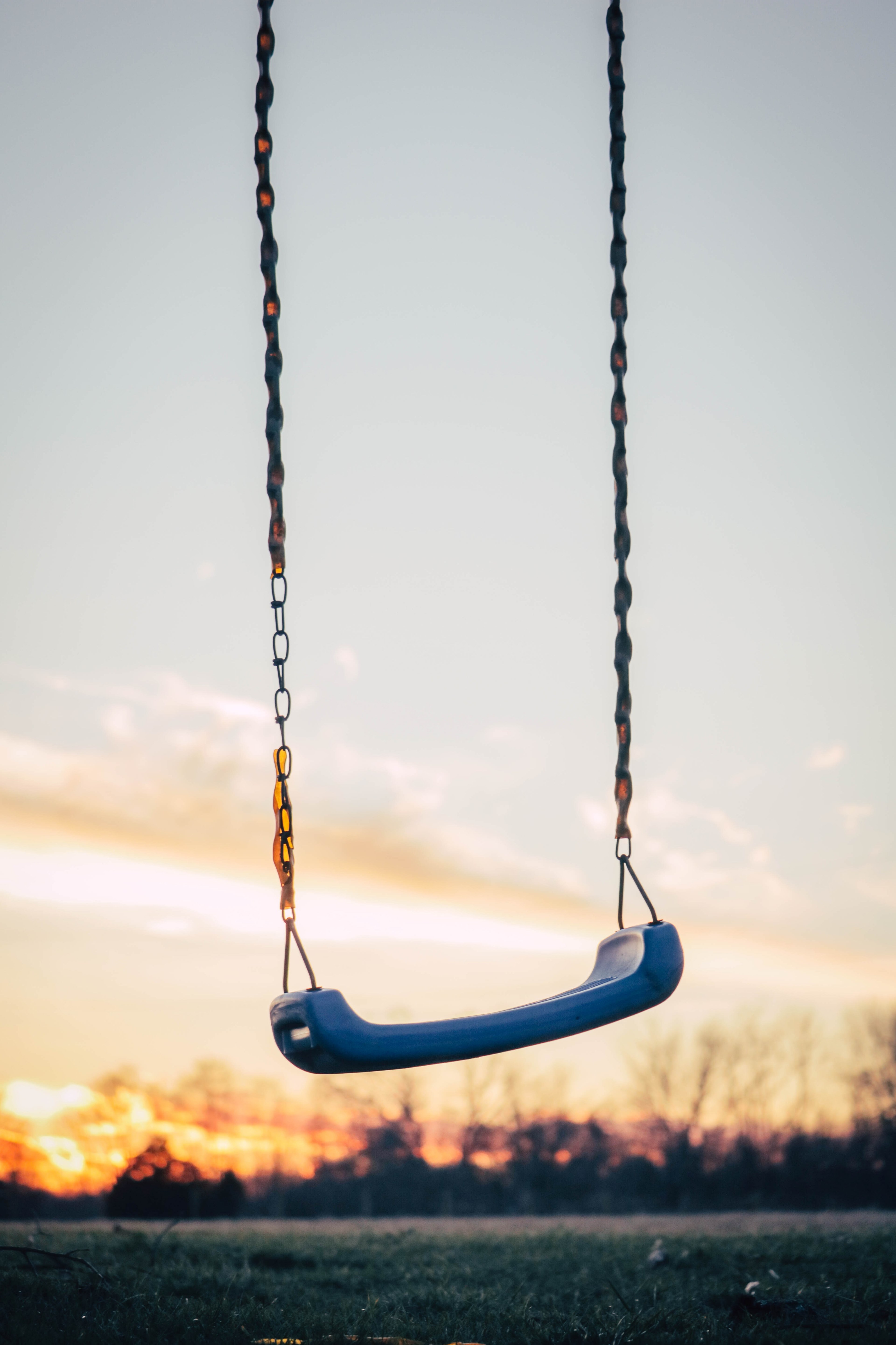 the macro view of a swing on grass at sunset, swing from my childhood 4k, Phone HD Wallpaper