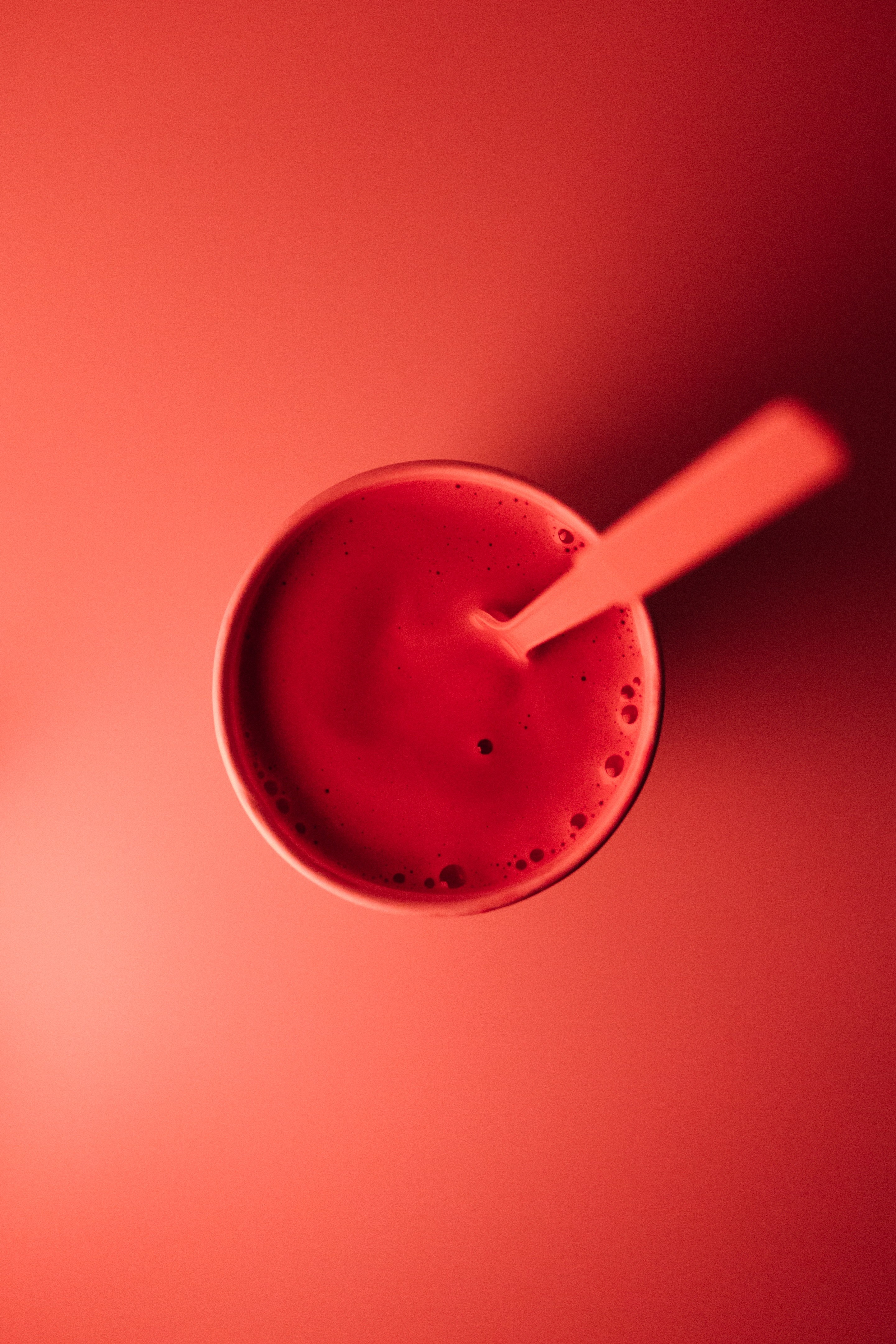a cup of red paint sitting on a red surface, _red paint cup 4k, Phone HD Wallpaper