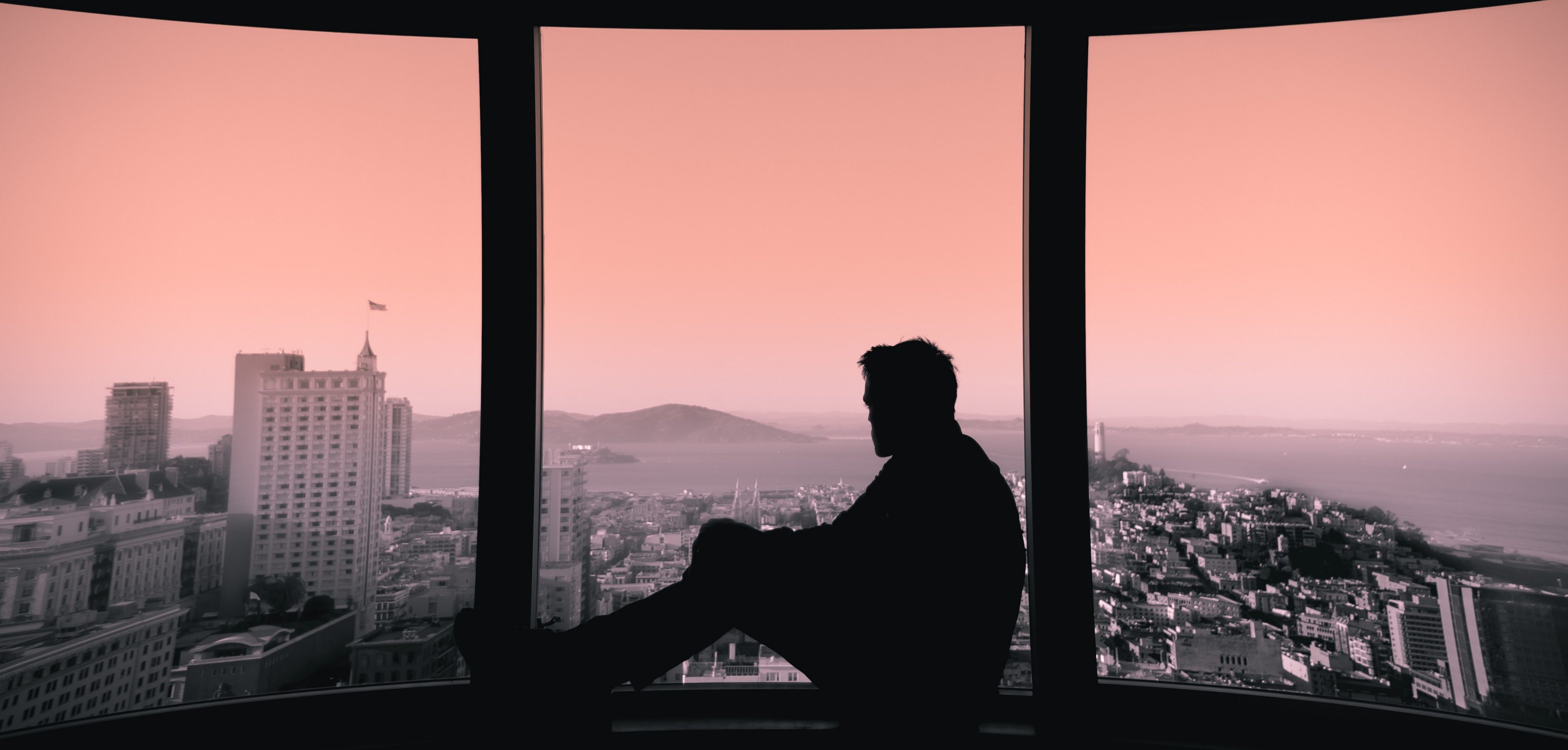a silhouette of a man sitting on a windowsill and looking out the window, went up the wrong elevator 4k, HD Wallpaper