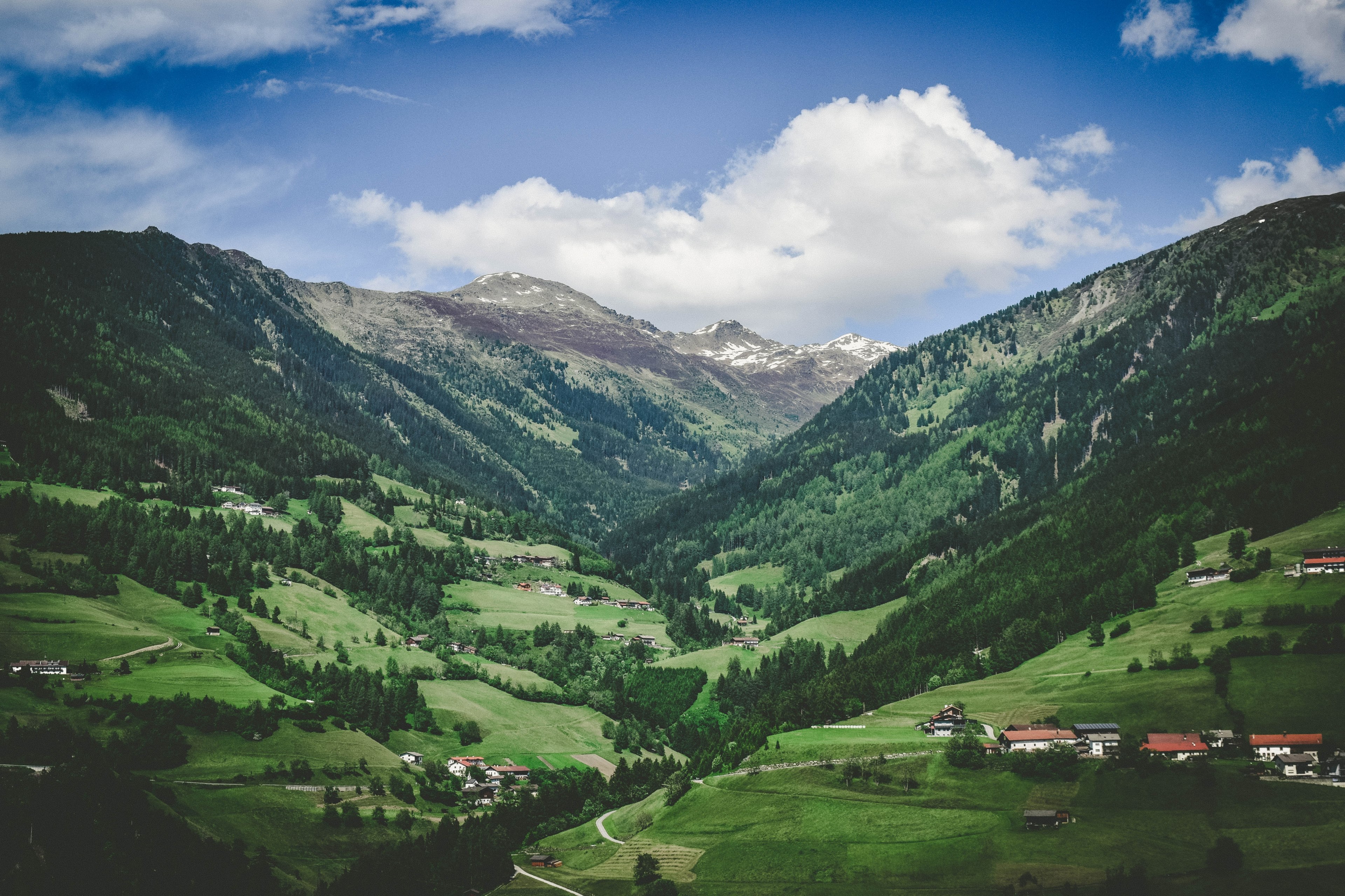 sparse buildings in a green mountain valley in austria, peaceful austrian valley 4k, HD Wallpaper