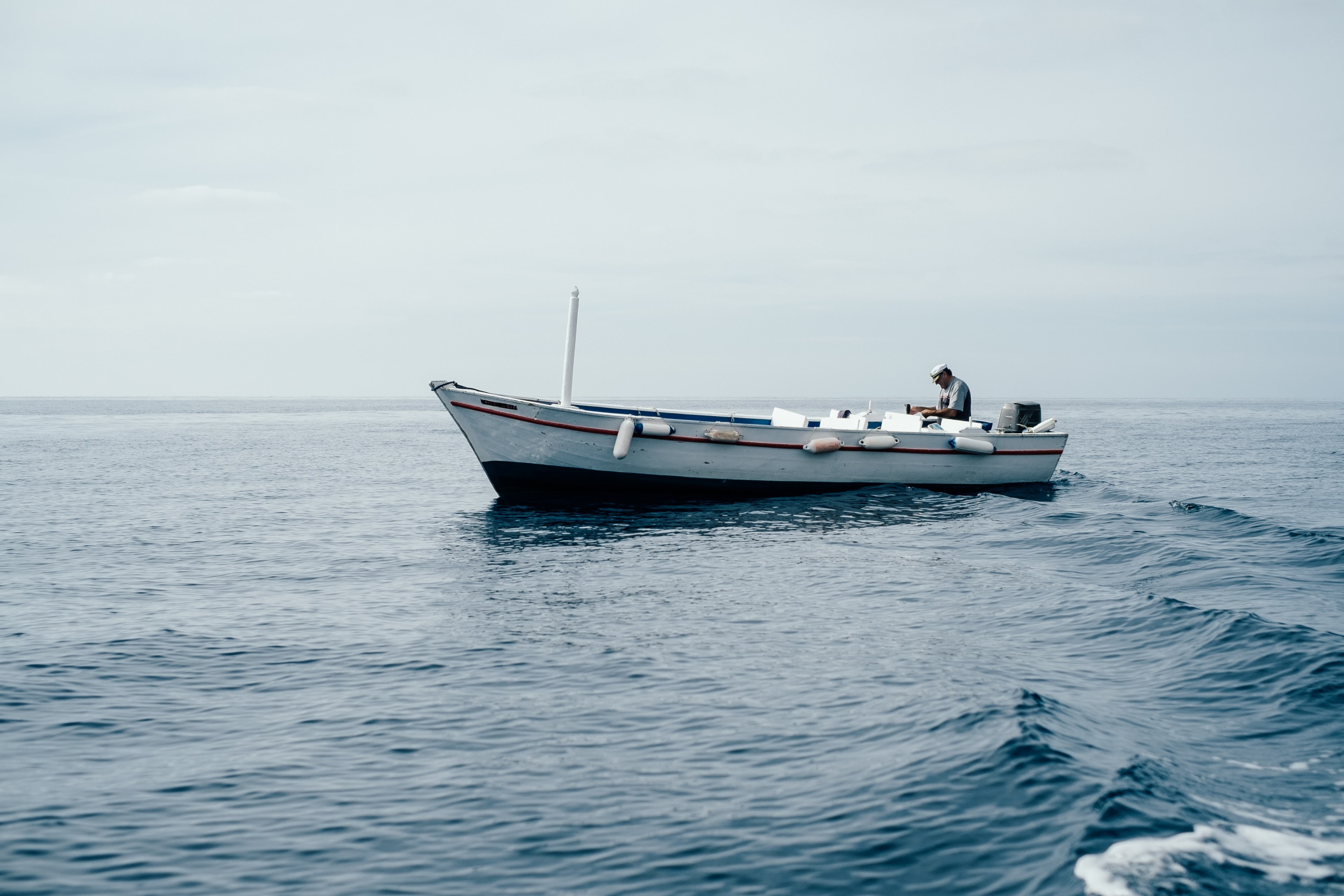 a white boat on the sea and the captain in corfu, corfu boat 4k, HD Wallpaper