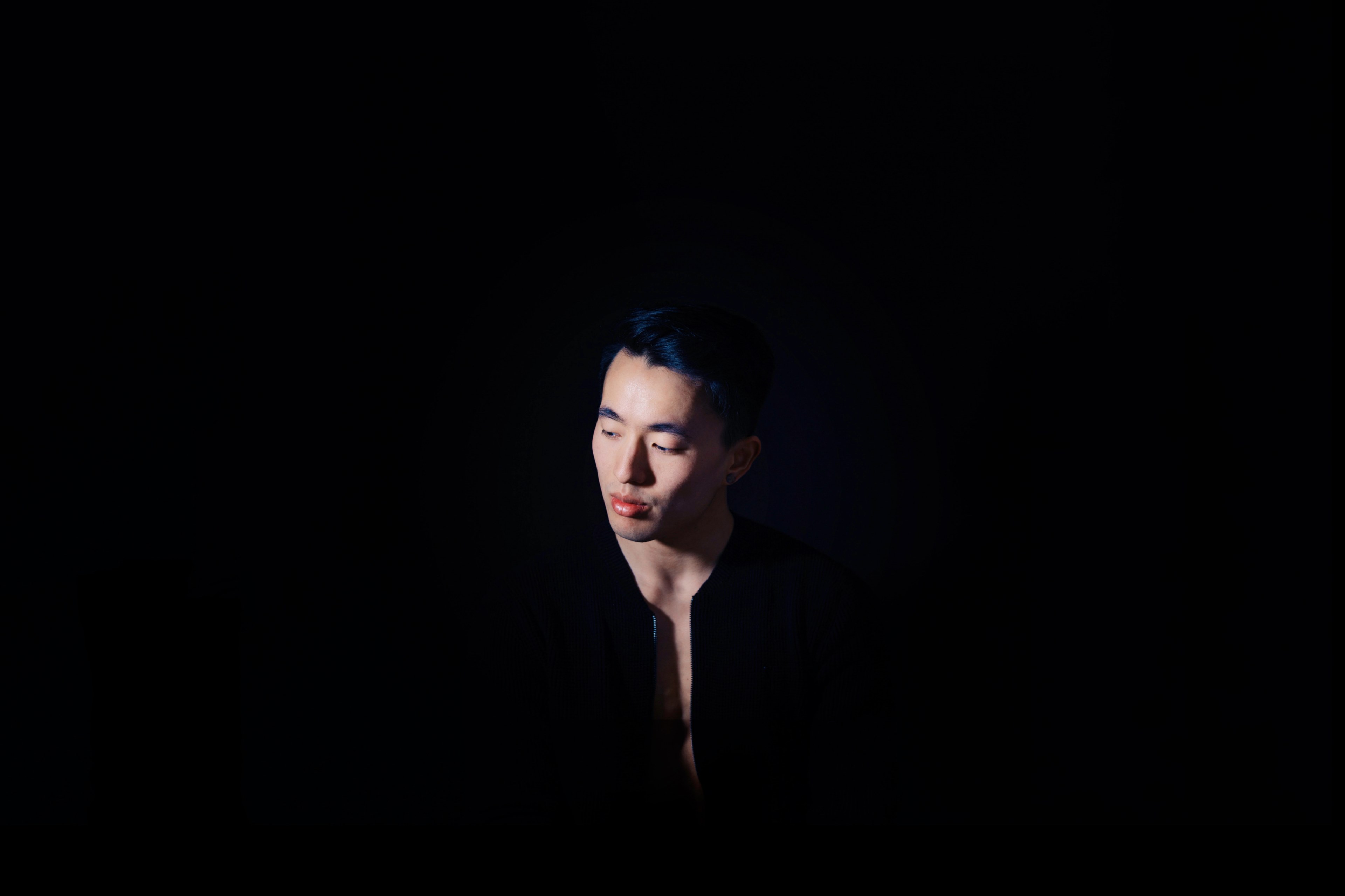 man shadowed in black with only his face lit, hiding from you 4k, HD Wallpaper