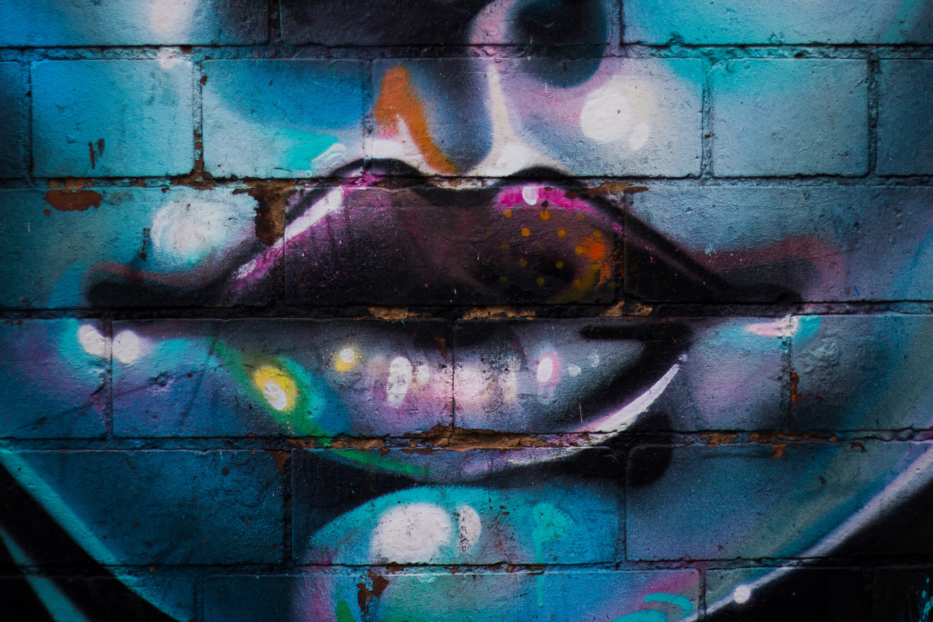 colorful lips chin and nose of a face painted on a brick wall, _brick wall face mural 4k, HD Wallpaper