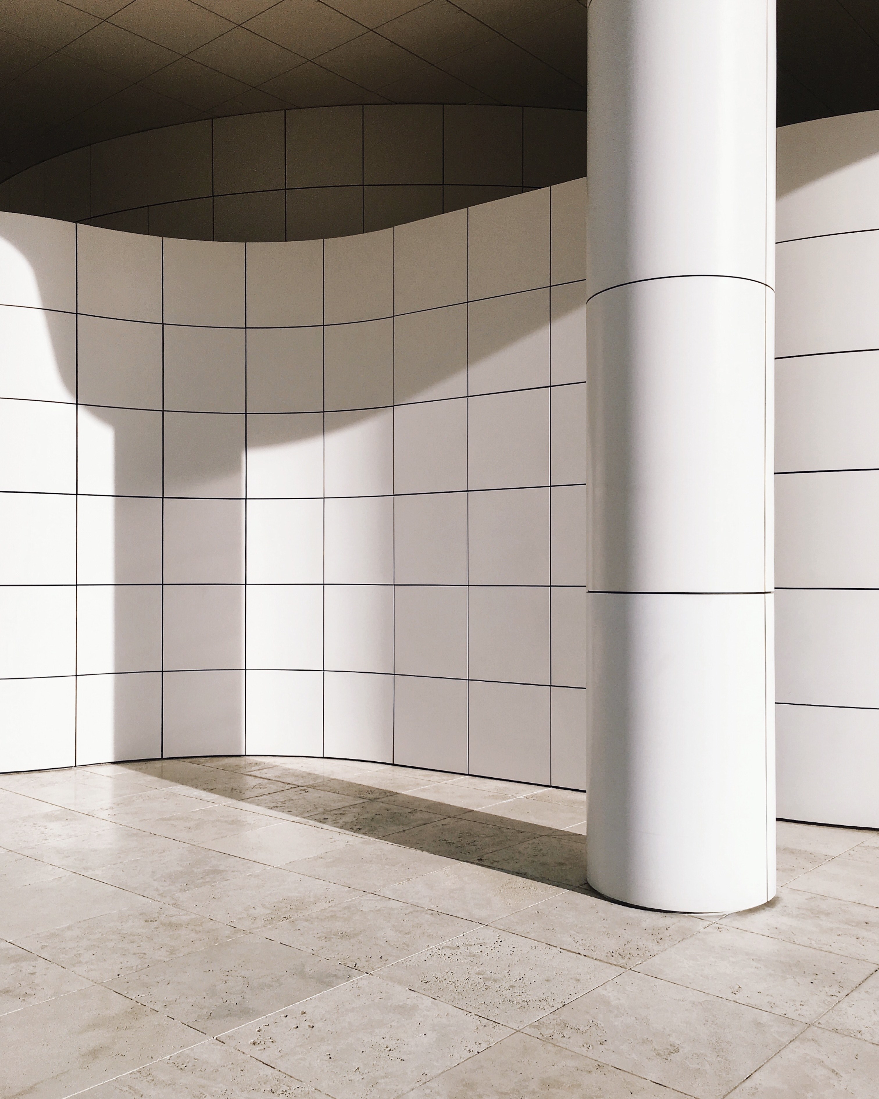 a tiled column casts a shadow onto wall of the getty museum, clean lines at the getty 4k, Phone HD Wallpaper