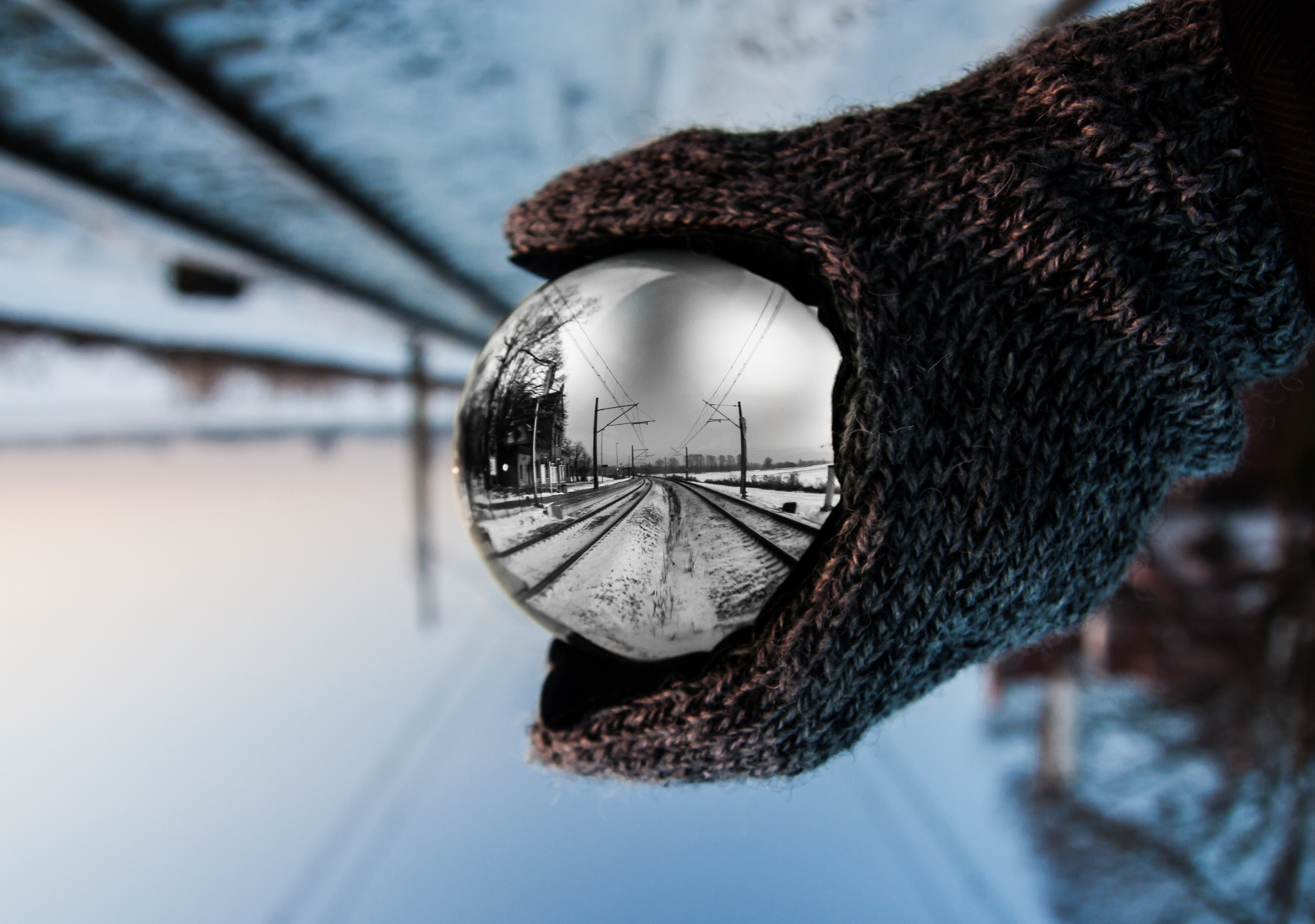 macro view of a hand with gloves holding a crystal ball showing reflection, hand holding crystal ball 4k, HD Wallpaper