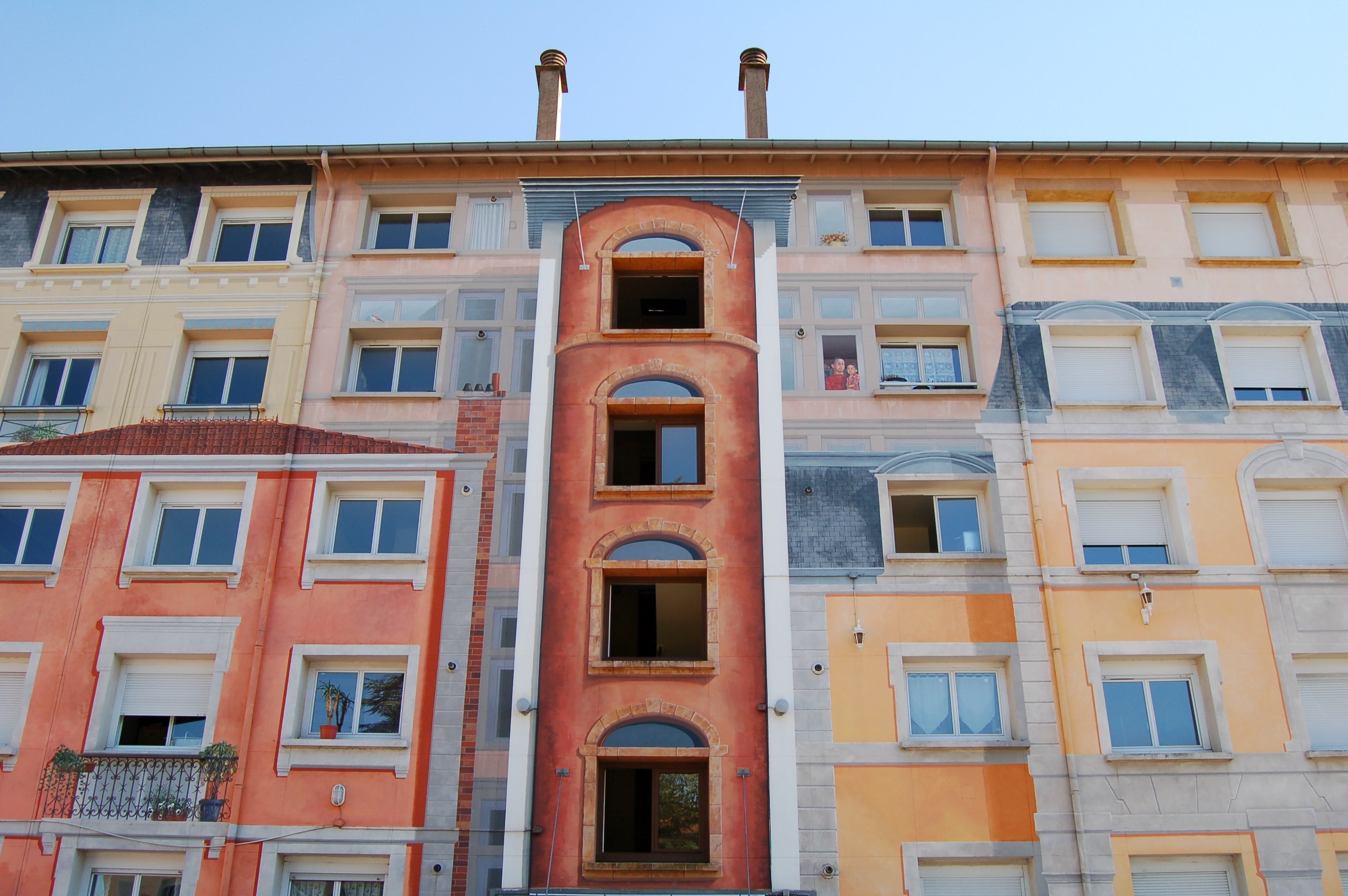 blue sky and urban building in lyon with multicolored walls and complex facade with varied windows, colorful apartment building 4k, HD Wallpaper