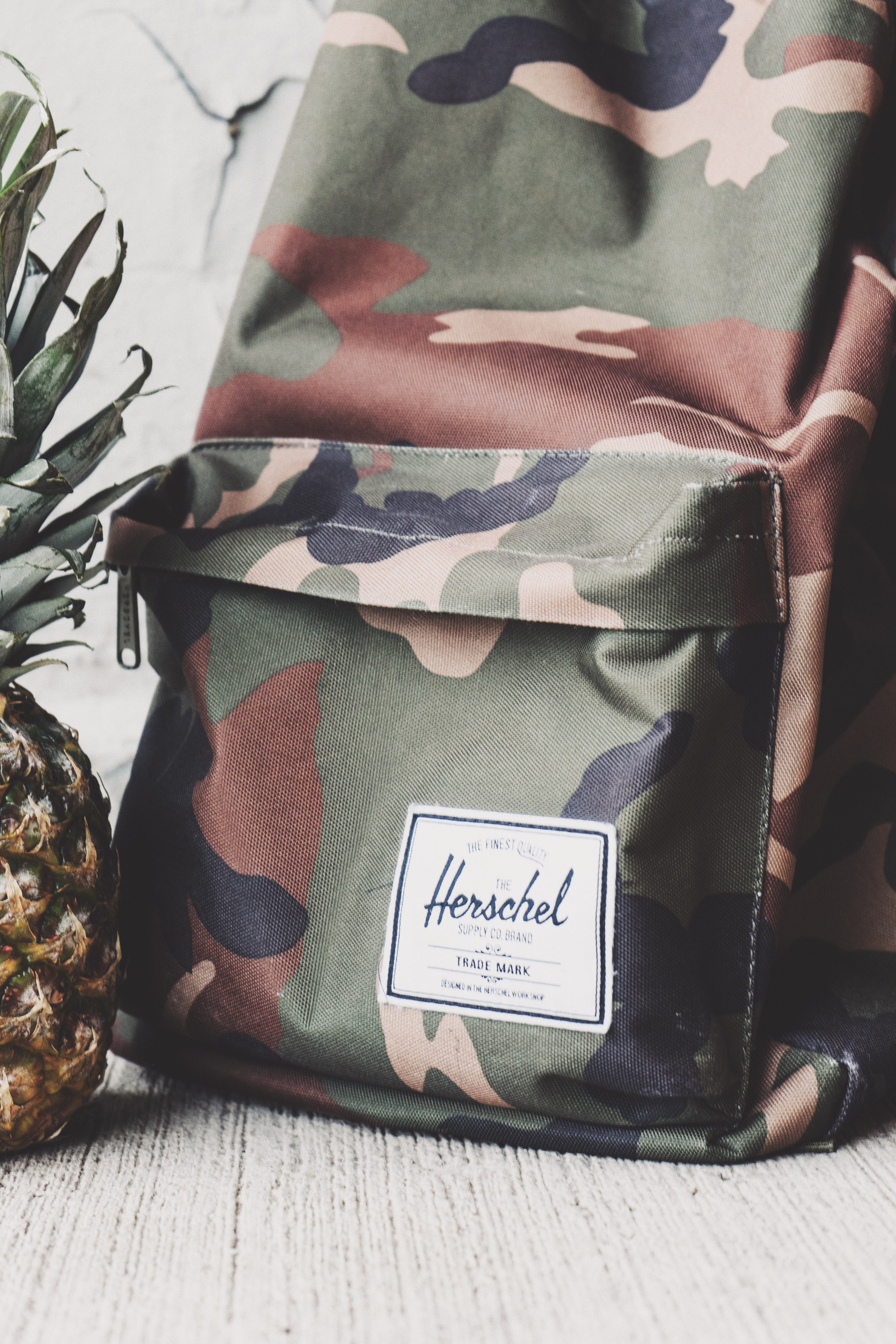 cropped shot of a camo backpack and part of a pineapple, _traveling with a pineapple 4k, Phone HD Wallpaper