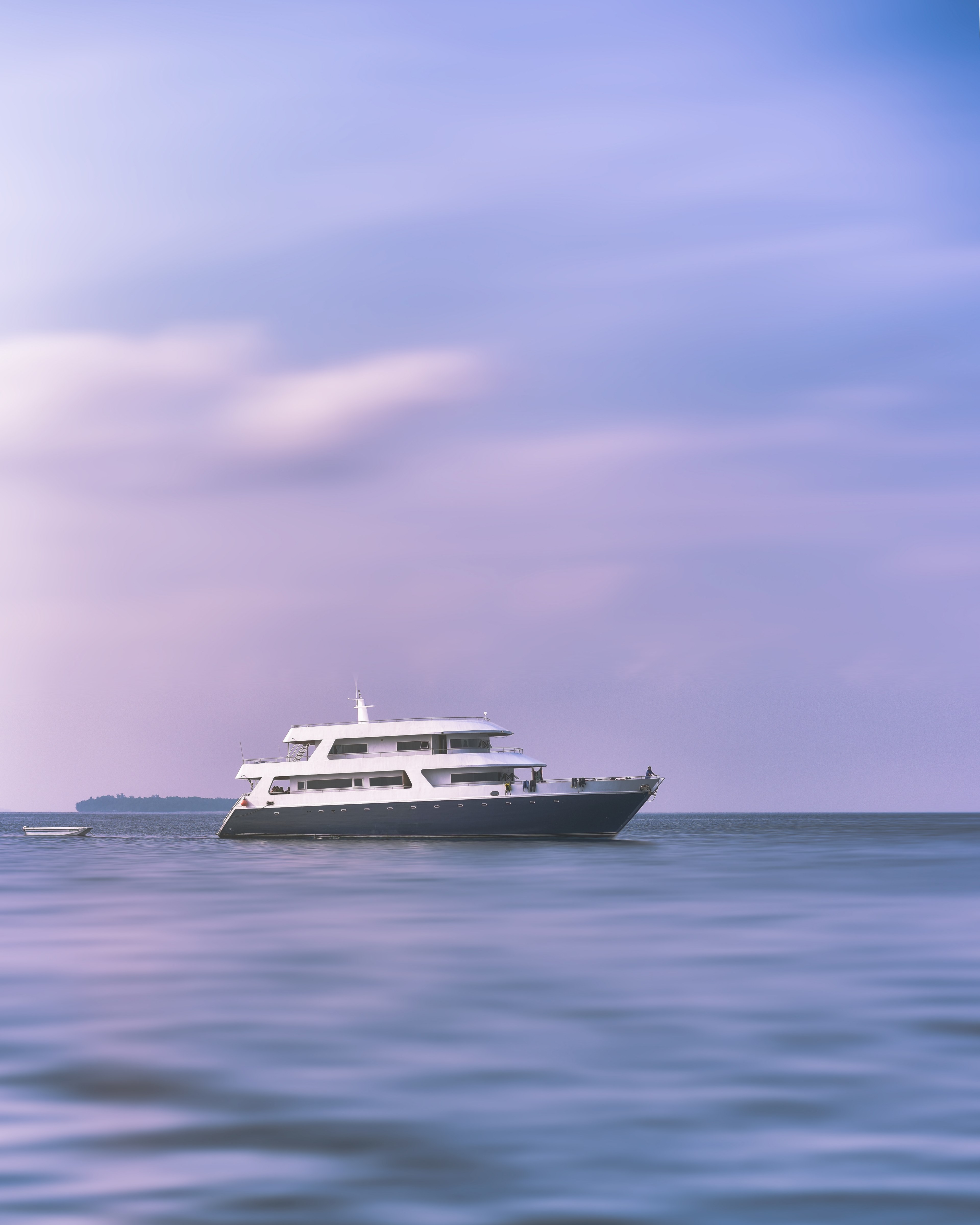 a yacht with a smaller boat on a calm sea in maafushi, idyll 4k, Phone HD Wallpaper