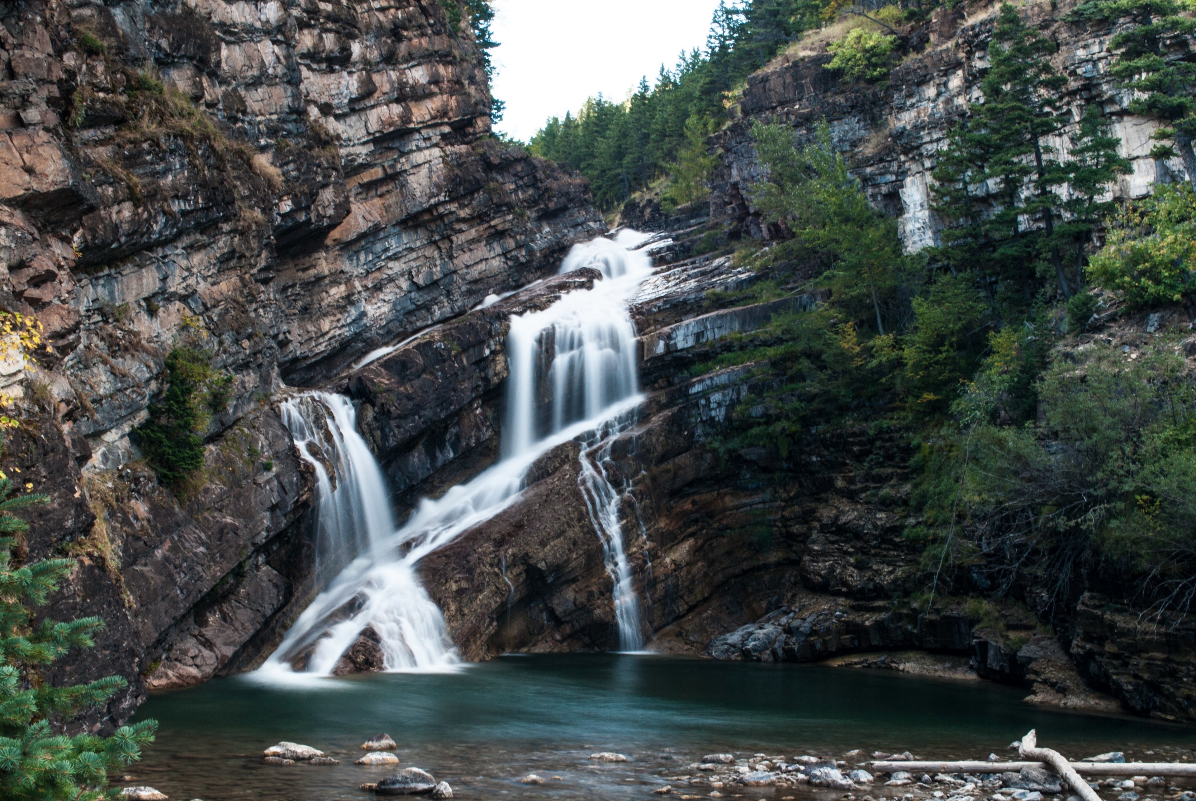 a waterfall pouring down a slanted rock face, waterfall on slanted rocks 4k, HD Wallpaper