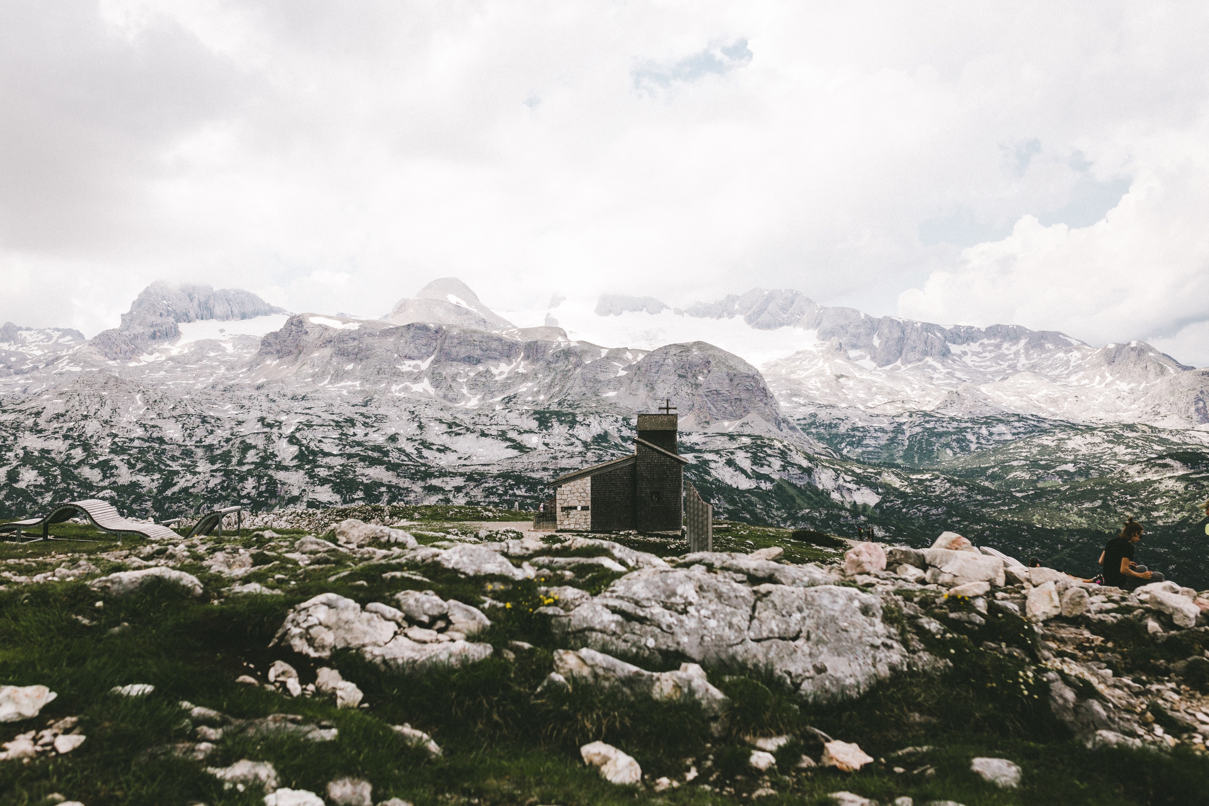 grassy dachstein mountains surrounded by rock and snowy, rocky grassy mountains 4k, HD Wallpaper