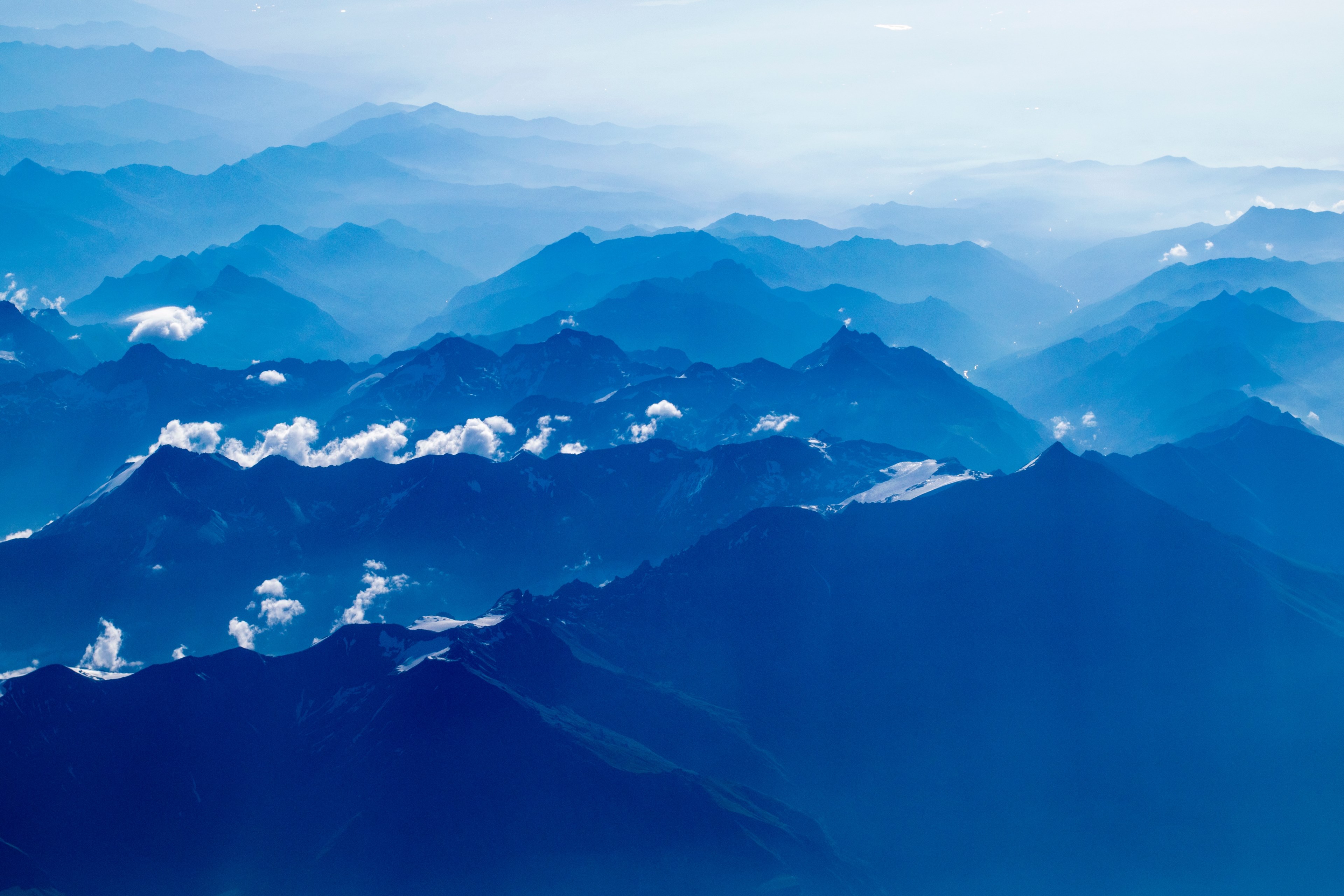 a blue hued aerial shot of a mountain range, blue mountains from above 4k, HD Wallpaper
