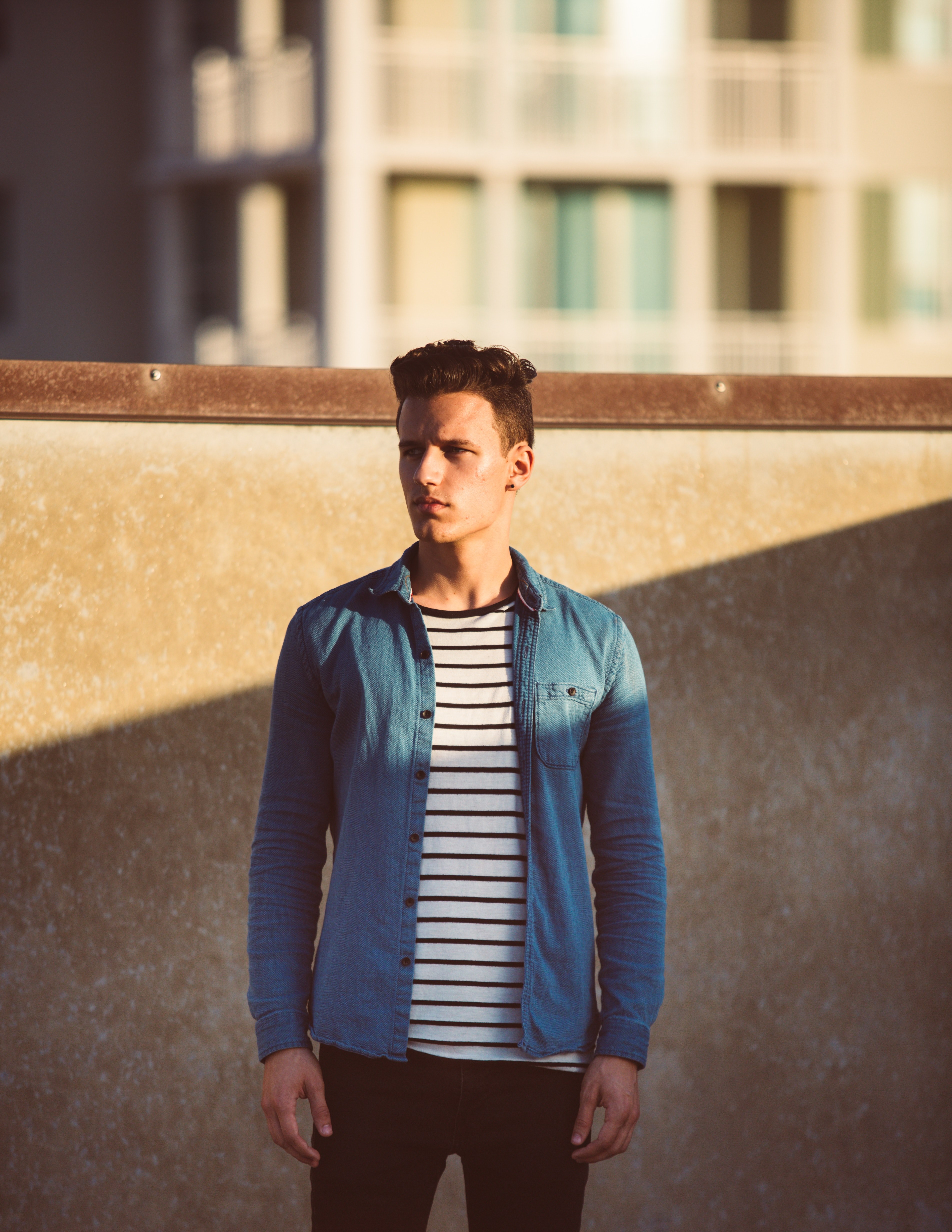 young man in t shirt and shirt posing in front of the wall at west palm beach, young man posing 4k, Phone HD Wallpaper