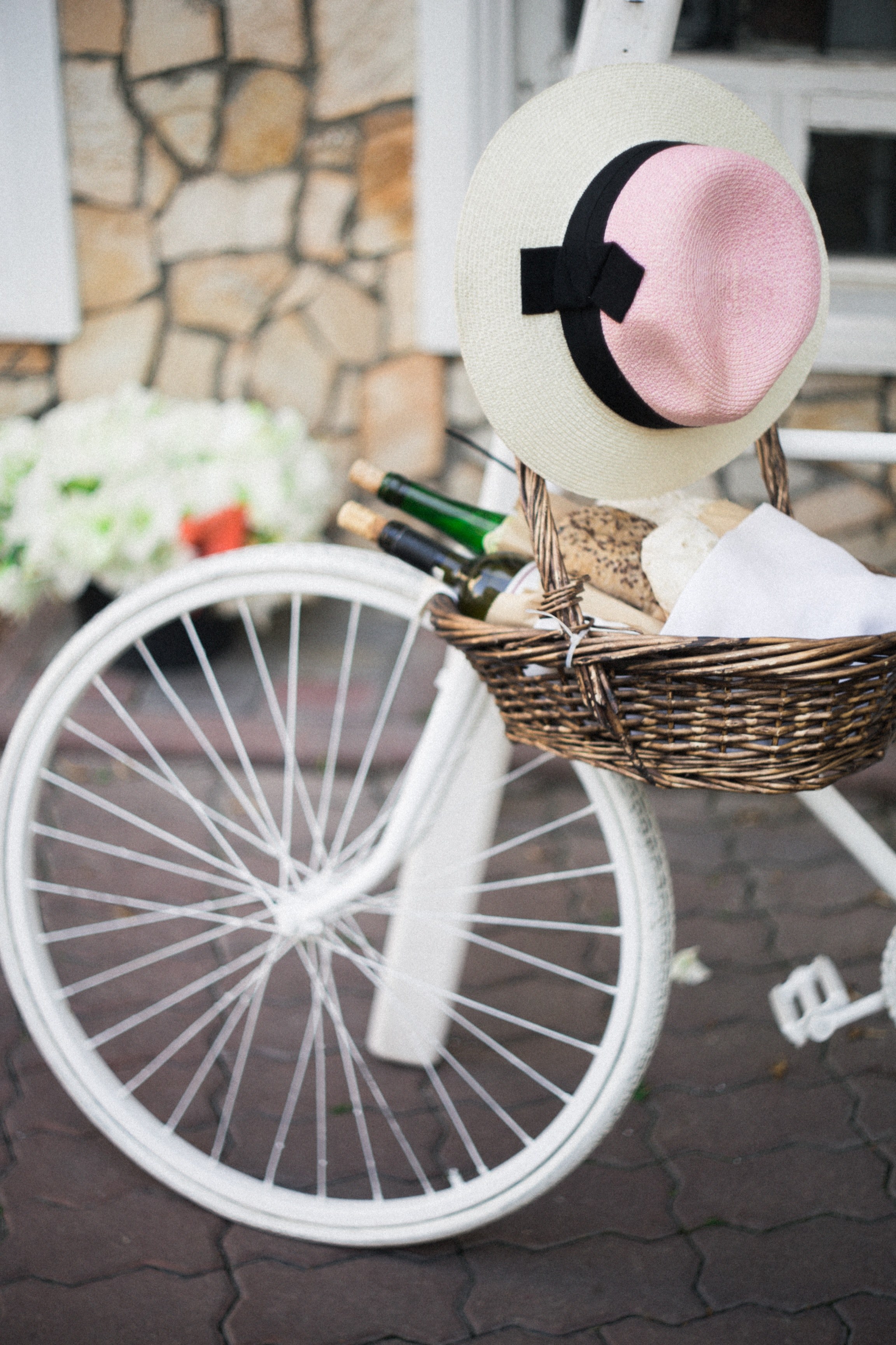 a basket with two bottles of wine and fresh bread hanging from the handlebar of a white bicycle, wine and bread 4k, Phone HD Wallpaper