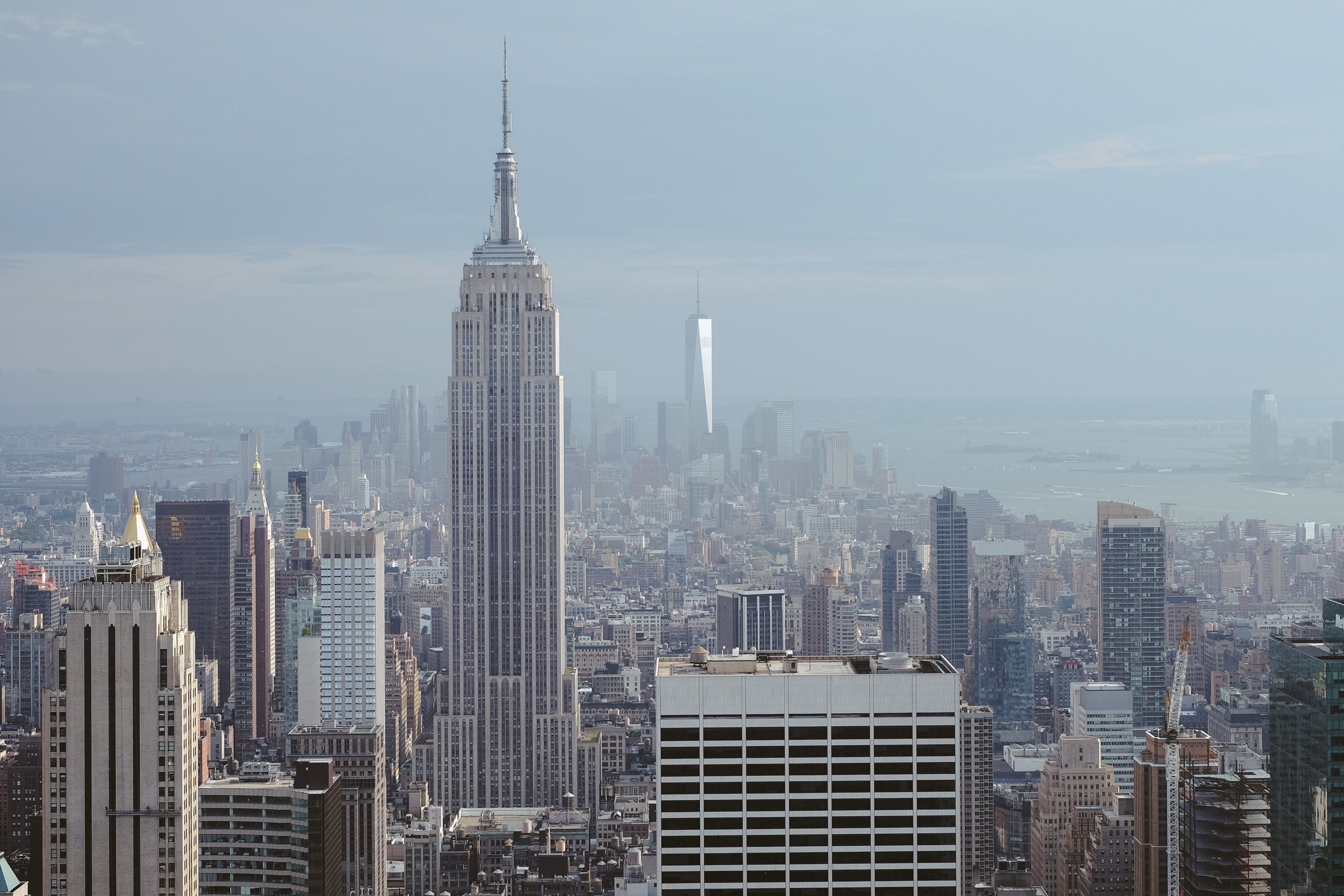 view of the empire state building and the financial district in the distance in new york city, my favorite skyscraper in the city 4k, HD Wallpaper