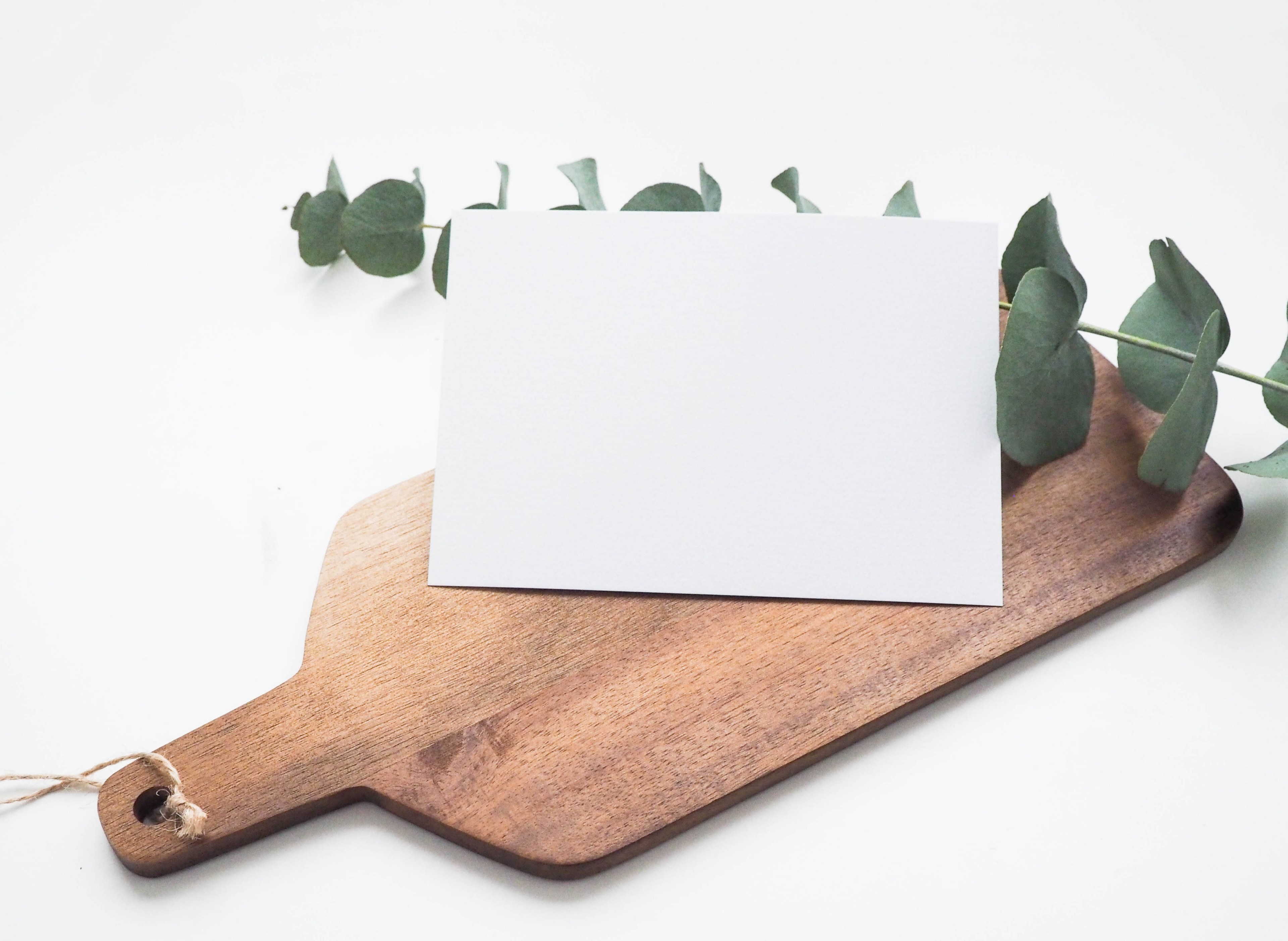a wooden cutting board with a branch and piece of paper on top, _wooden cutting board 4k, HD Wallpaper