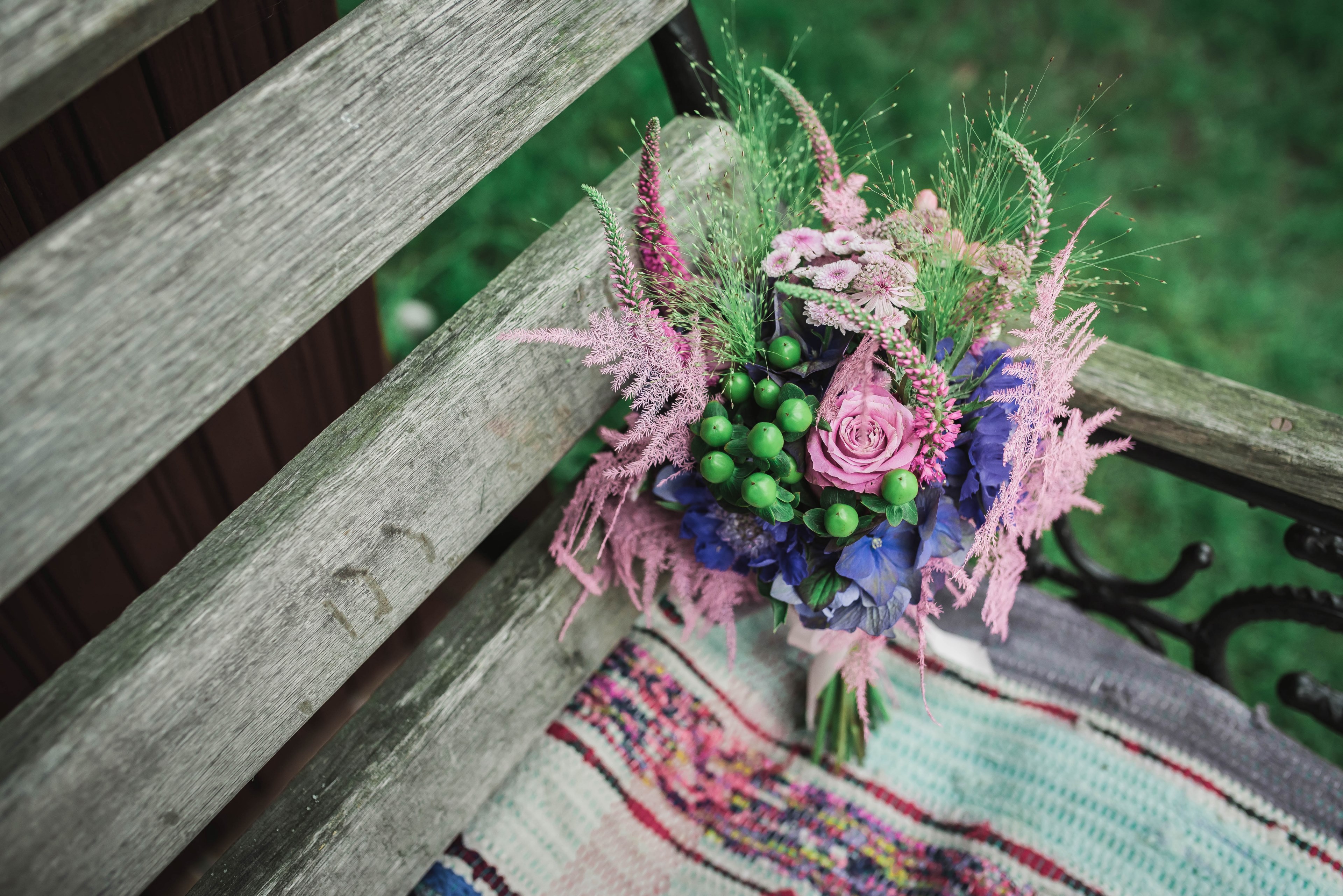 a bouquet of various flowers berries and grasses on an old wooden bench, bouquet left on a bench 4k, HD Wallpaper