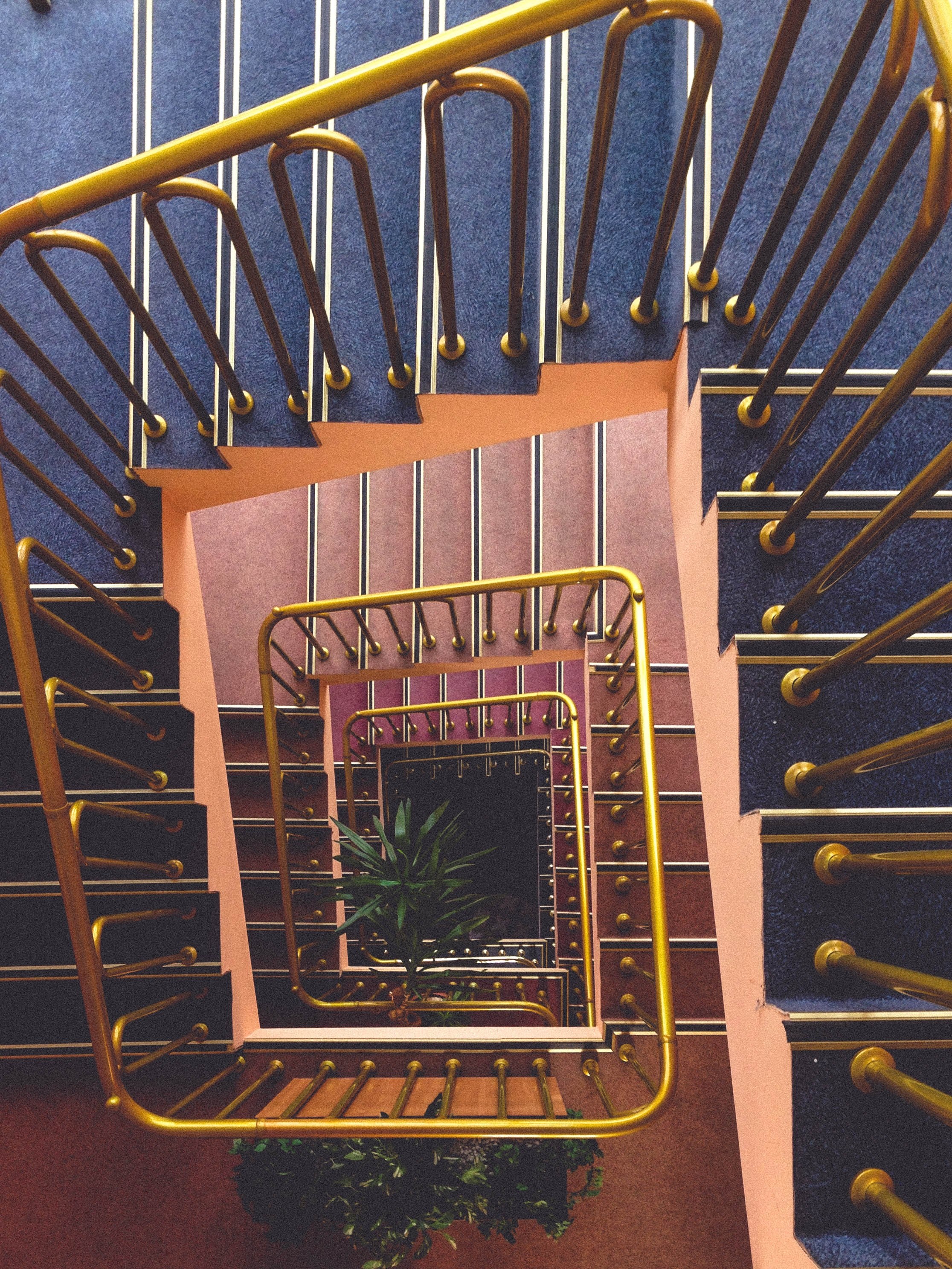 looking down at a vintage spiral staircase with a gold banister, patterns in perspectives 4k, Phone HD Wallpaper