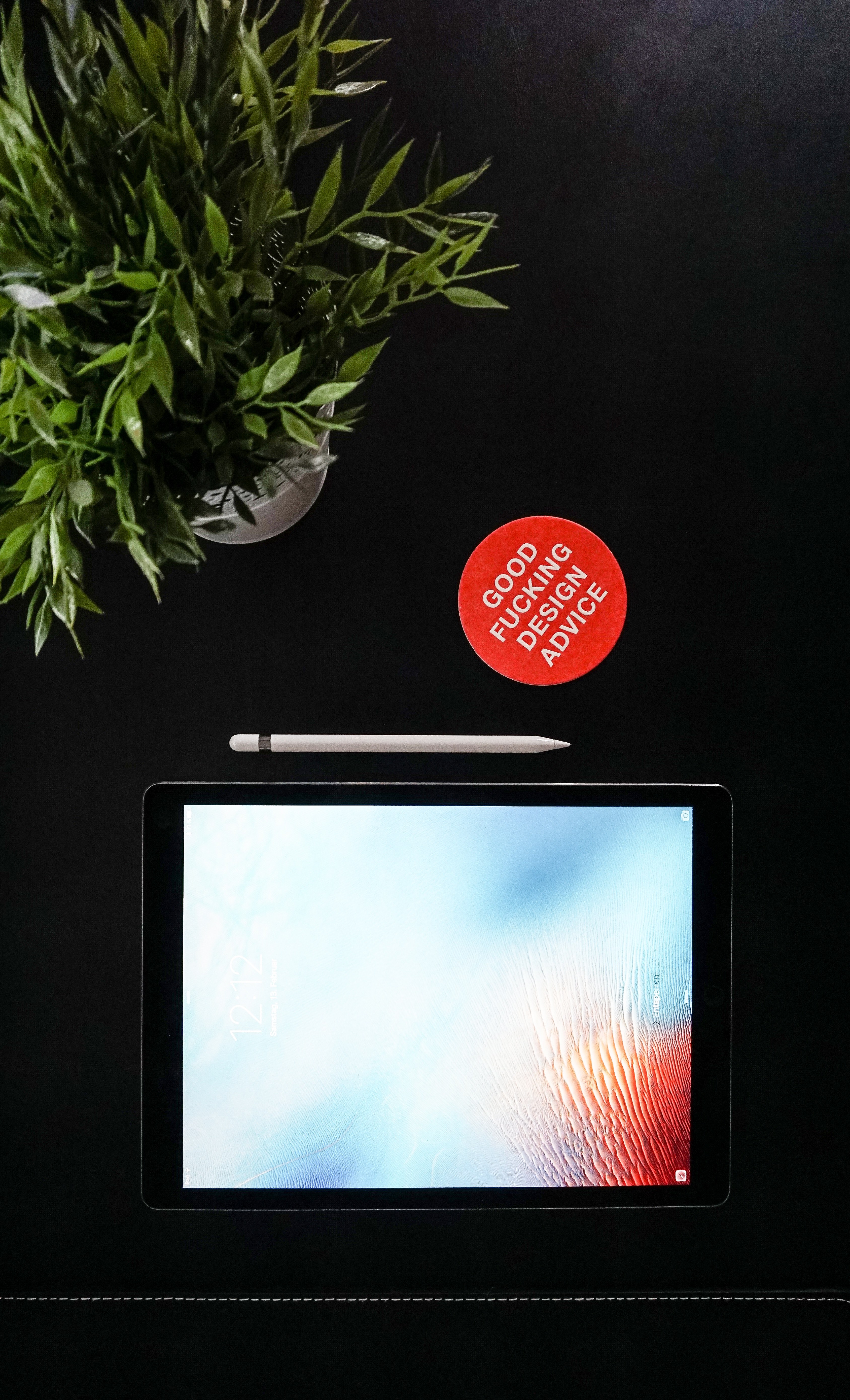 tablet with blank display and stylus next to plant and design text in red circle, design text tablet stylus 4k, Phone HD Wallpaper