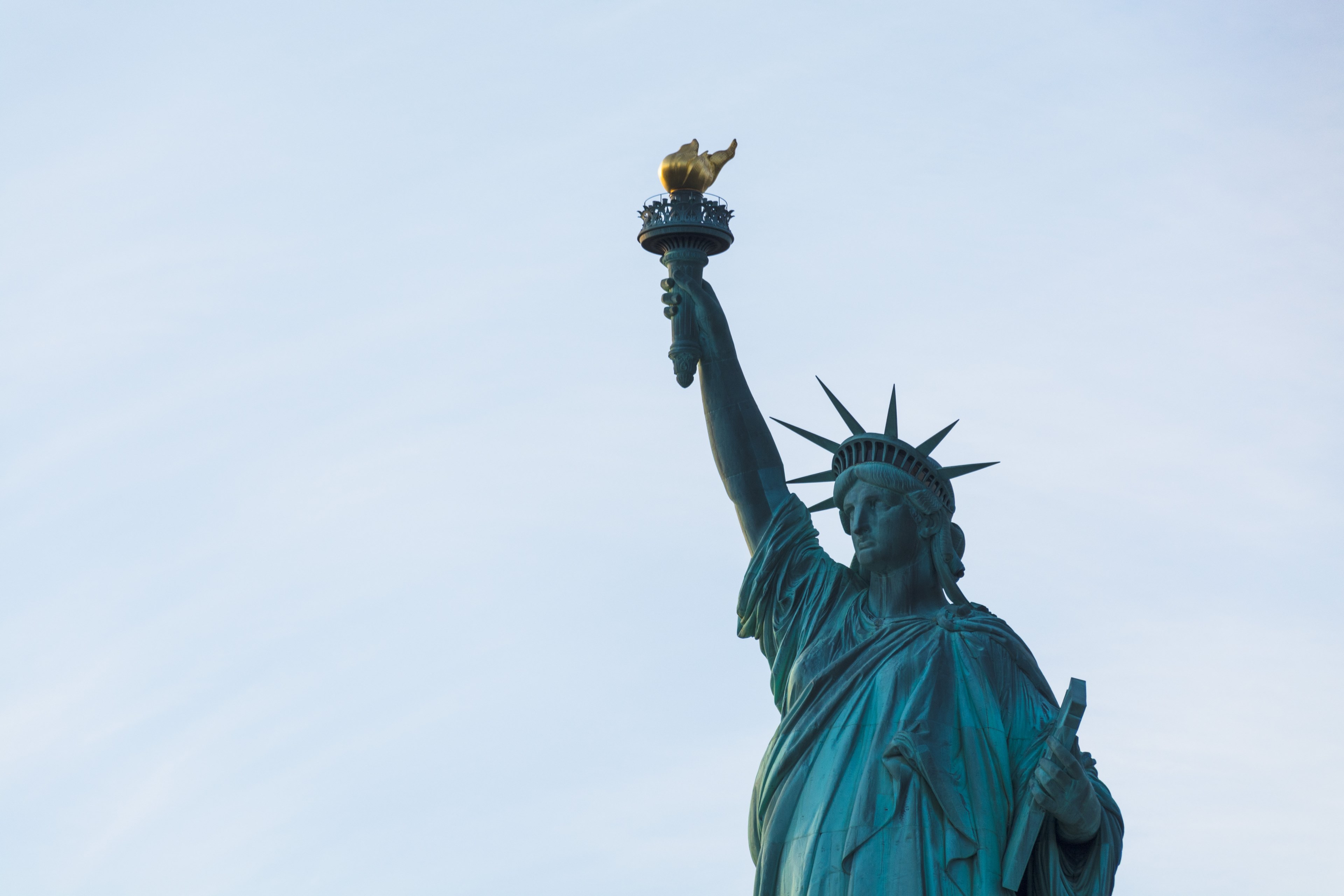the statue of liberty in new york city with the blue sky behind her, i lift my lamp beside the golden door 4k, HD Wallpaper