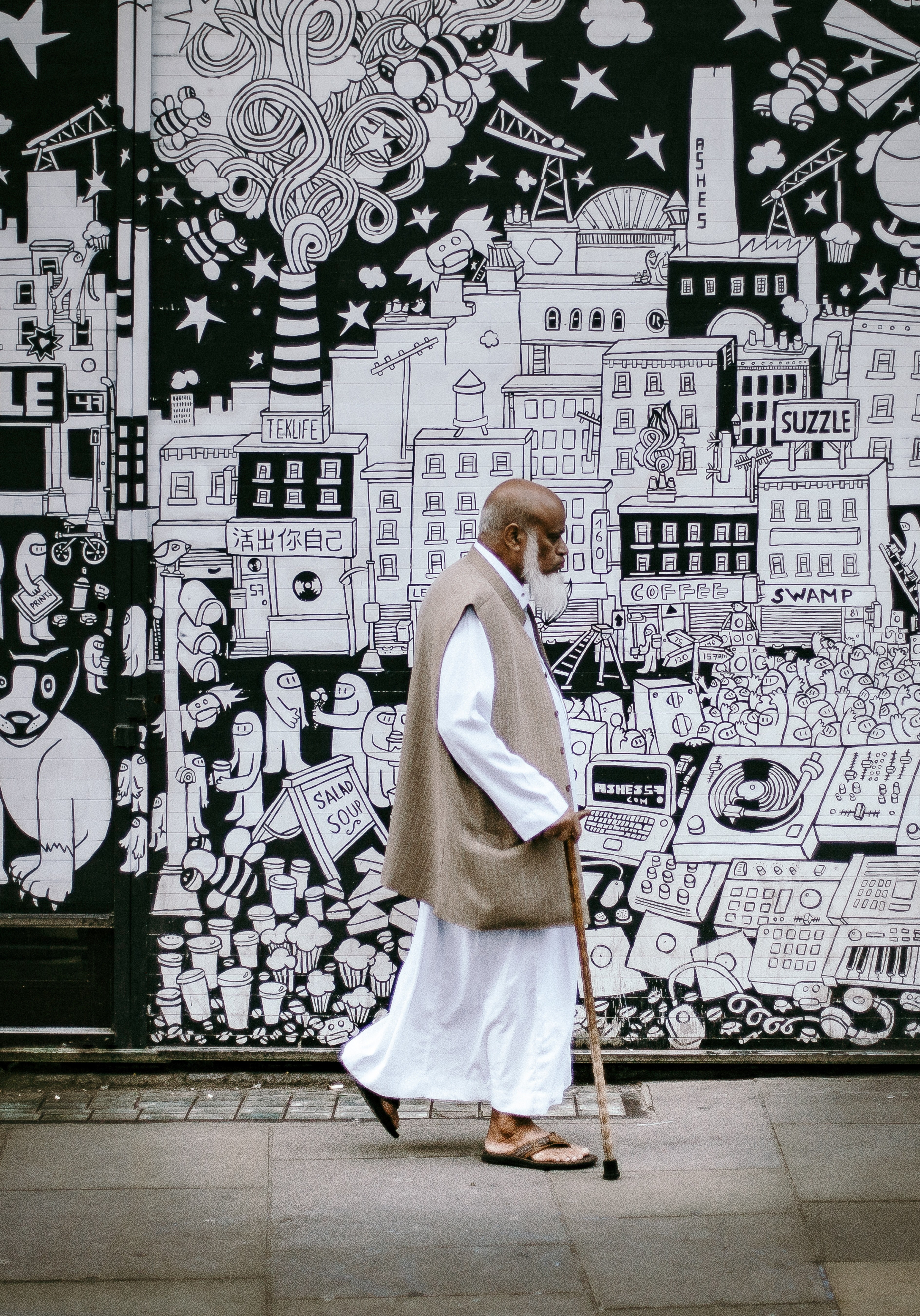 man with cane and white beard walking near black and white street art on brick lane, man with stick on brick lane 4k, Phone HD Wallpaper