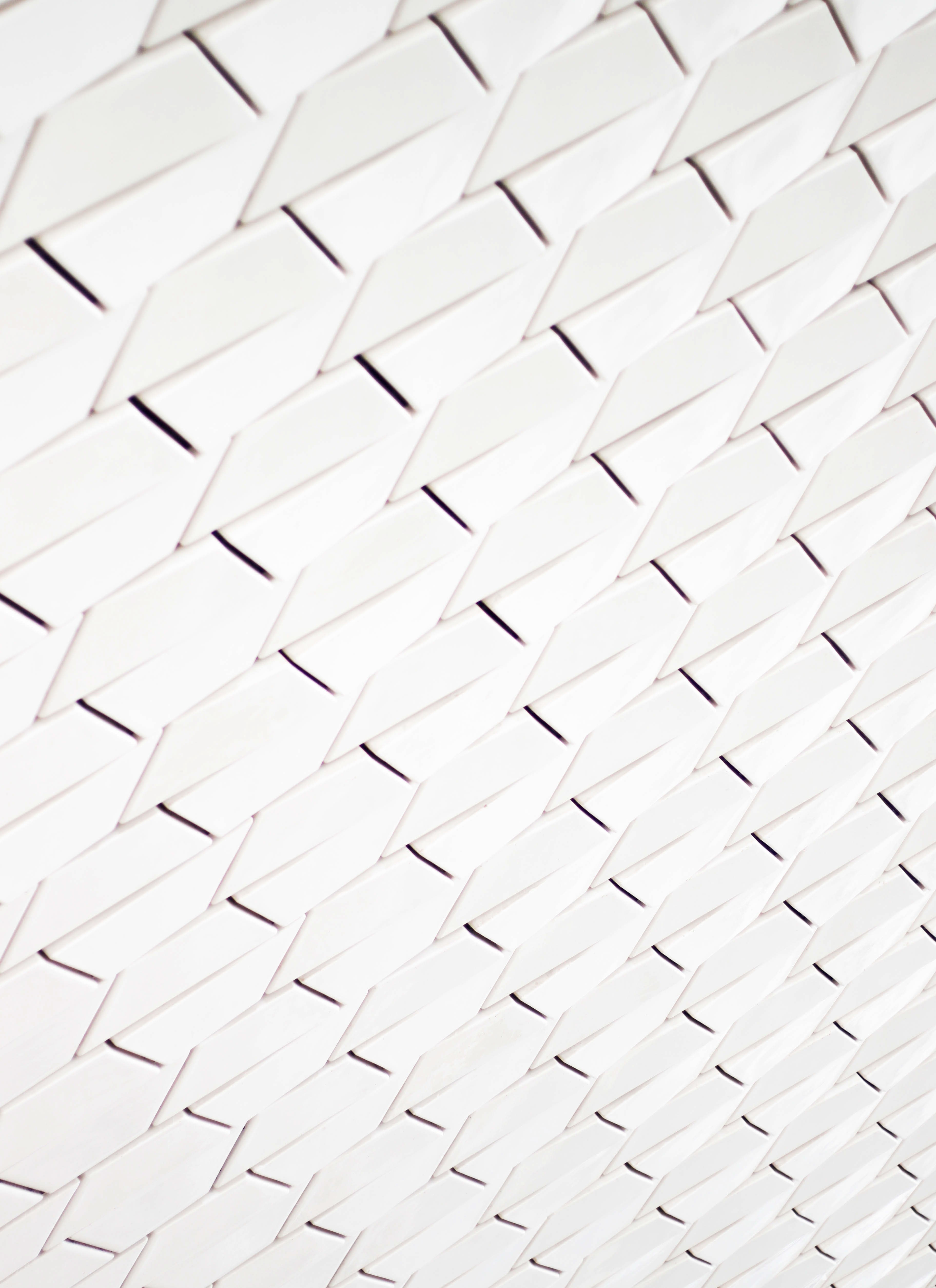 a pattern of white geometric shapes in a facade, maat museum 4k, Phone HD Wallpaper