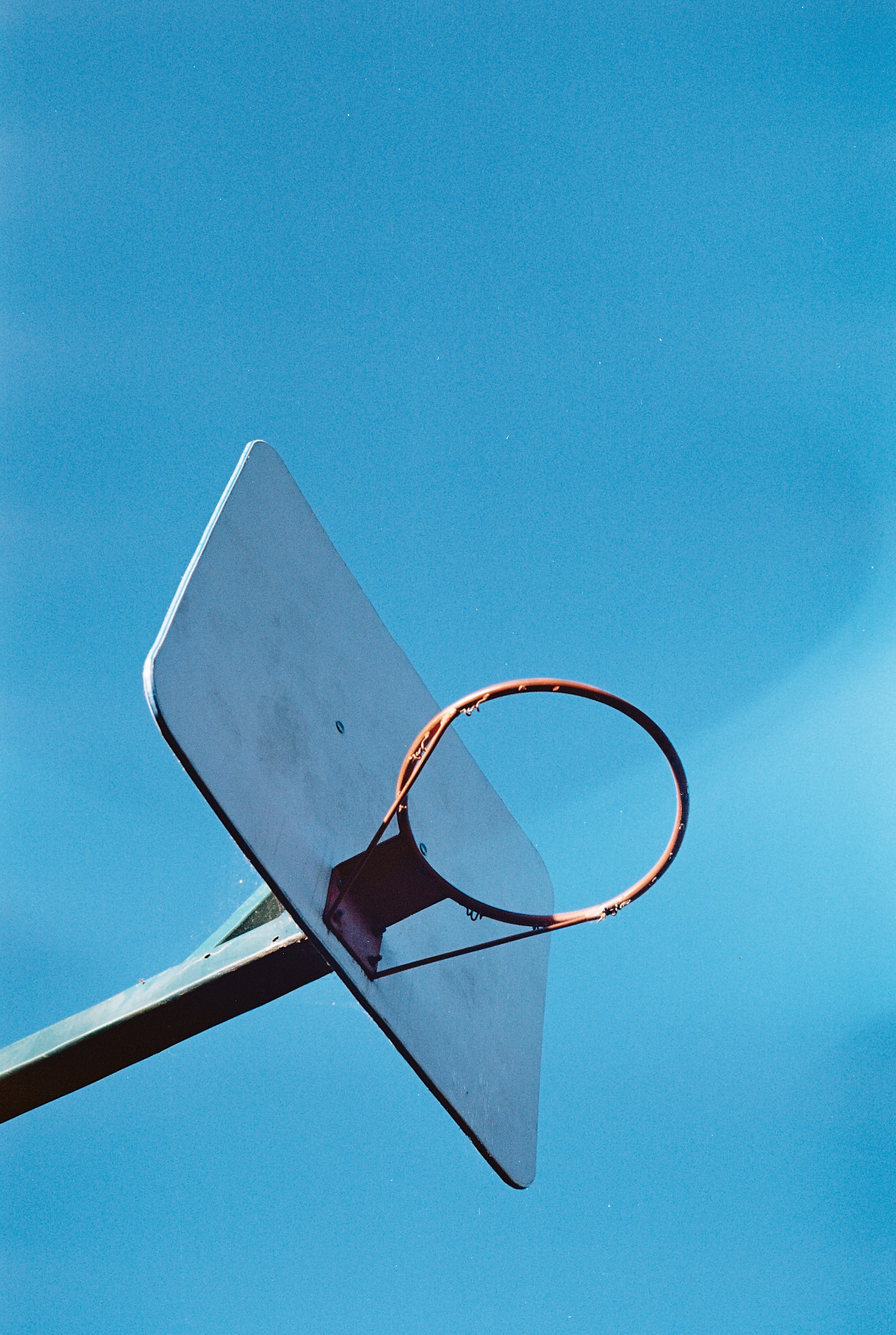 a baseball hoop without the net against a blue sky, damaged baseball hoop 4k, Phone HD Wallpaper