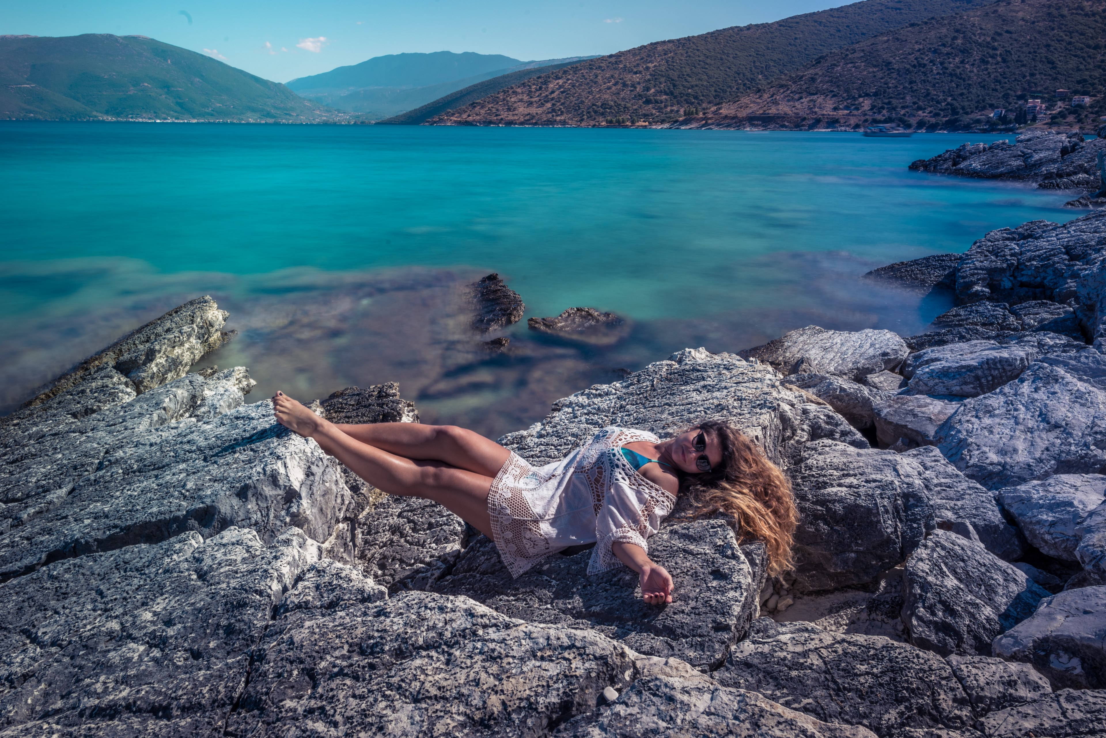 rocks woman blue and sea 4k, HD Wallpaper