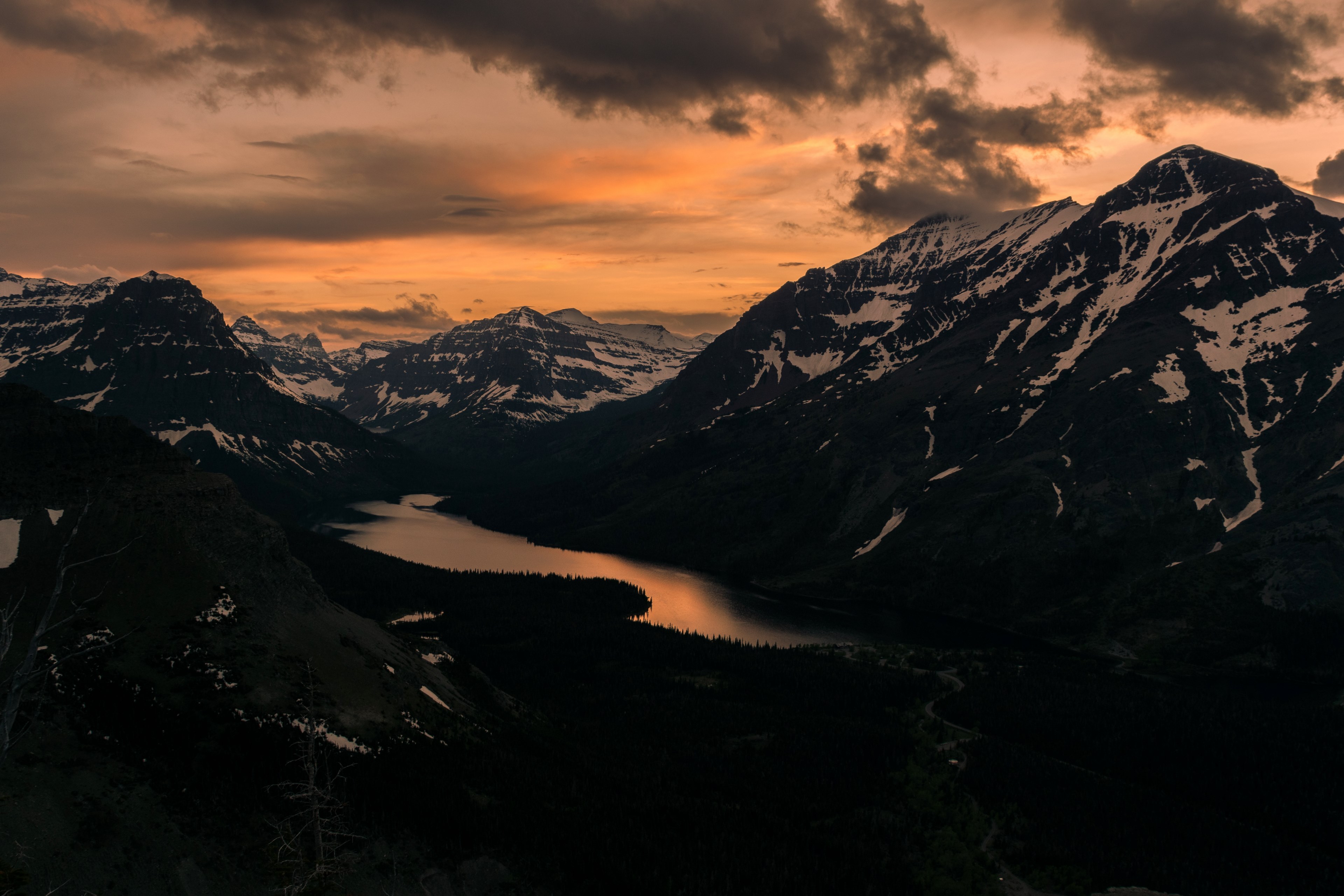 the river reflects the sun kissed cloudy sky with snow covered mountains on either side, sun kissed skies river and snowy mountains 4k, HD Wallpaper