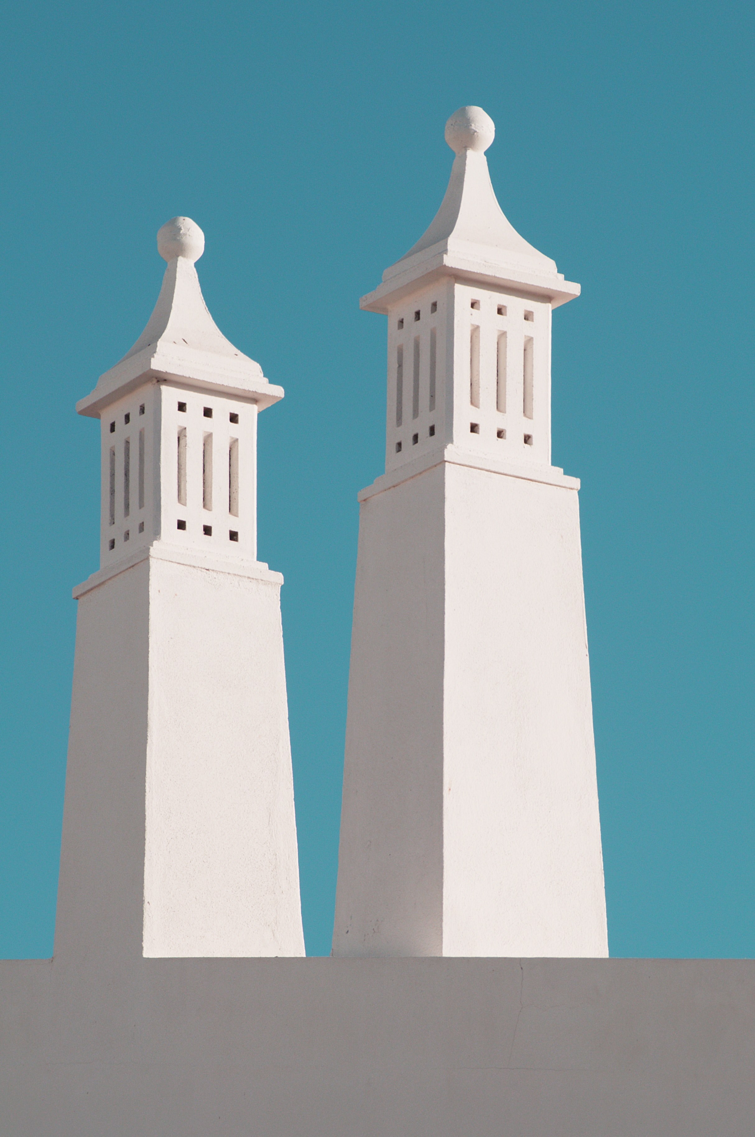 white concrete spires against a blue sky, white mediterranean spires 4k, Phone HD Wallpaper