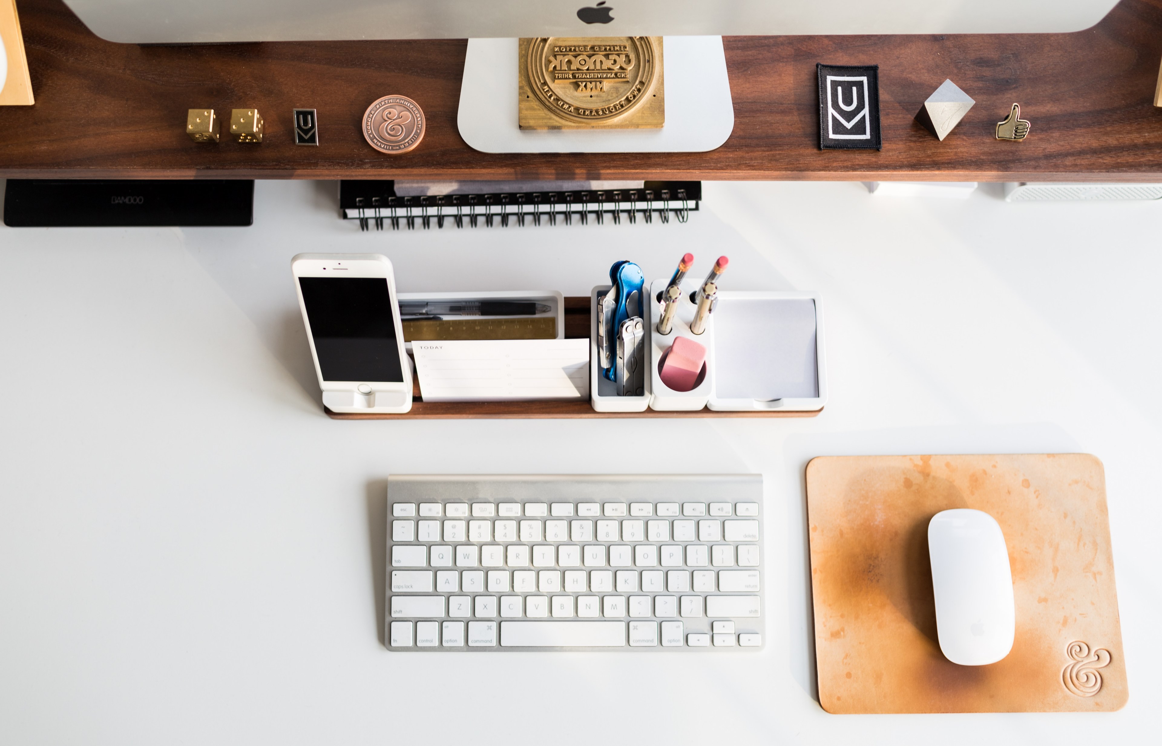 an overhead shot of a tray with an iphone and office supplies on a computer desk, overhead desktop workspace 4k, HD Wallpaper