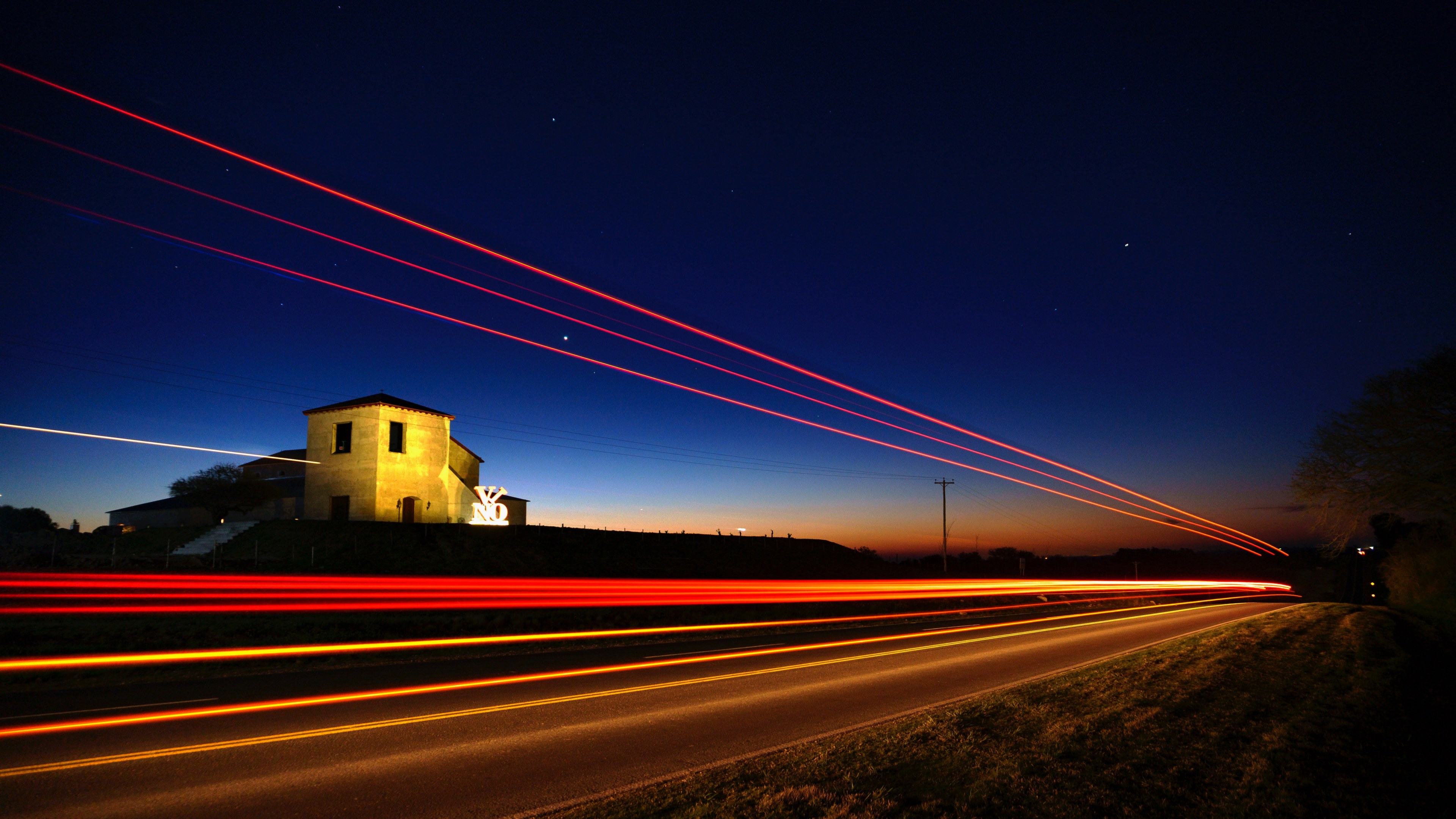 a gleaming red light trail shining down a dark road in victoria, night traffic at bordero 4k, HD Wallpaper
