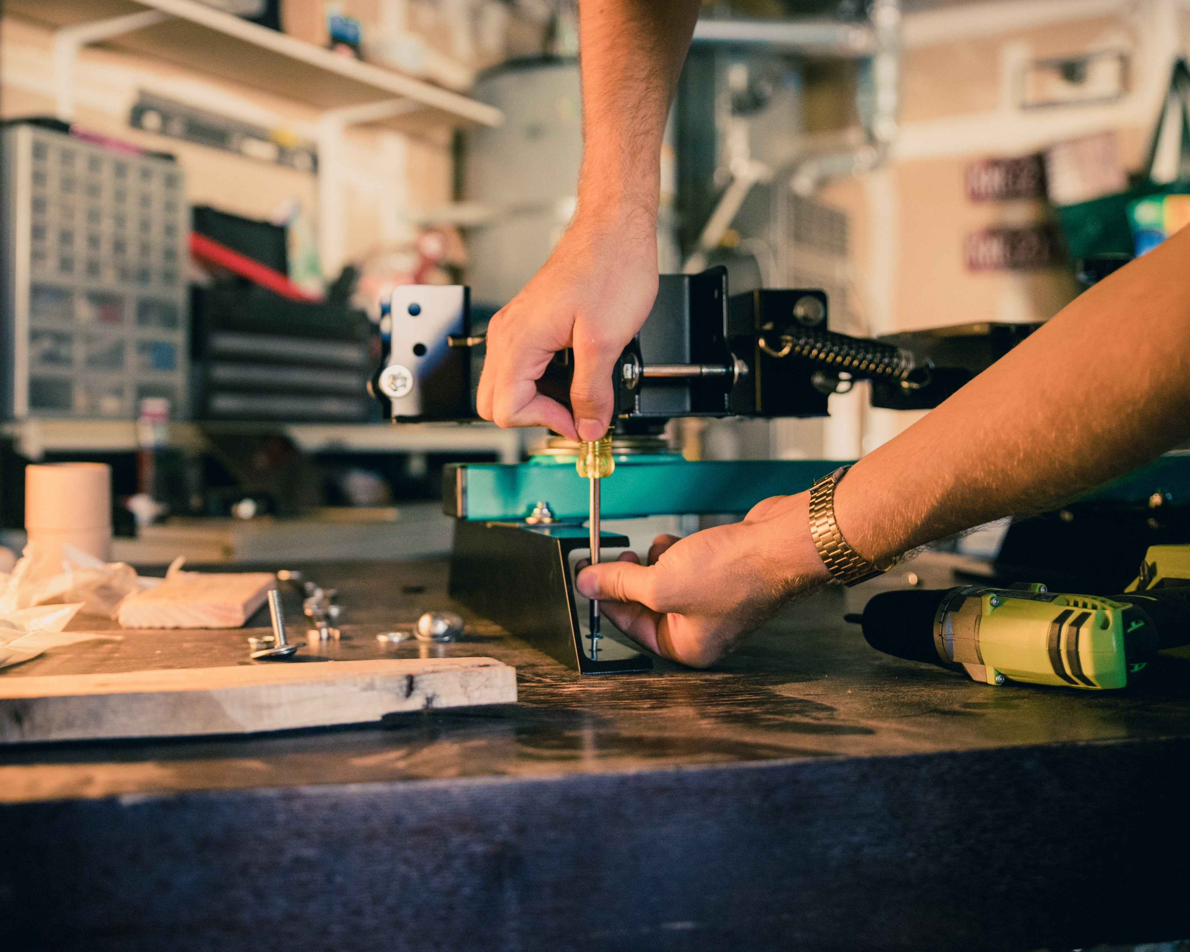 a person working at his workbench screwing something in with a screwdriver, workbench 4k, HD Wallpaper
