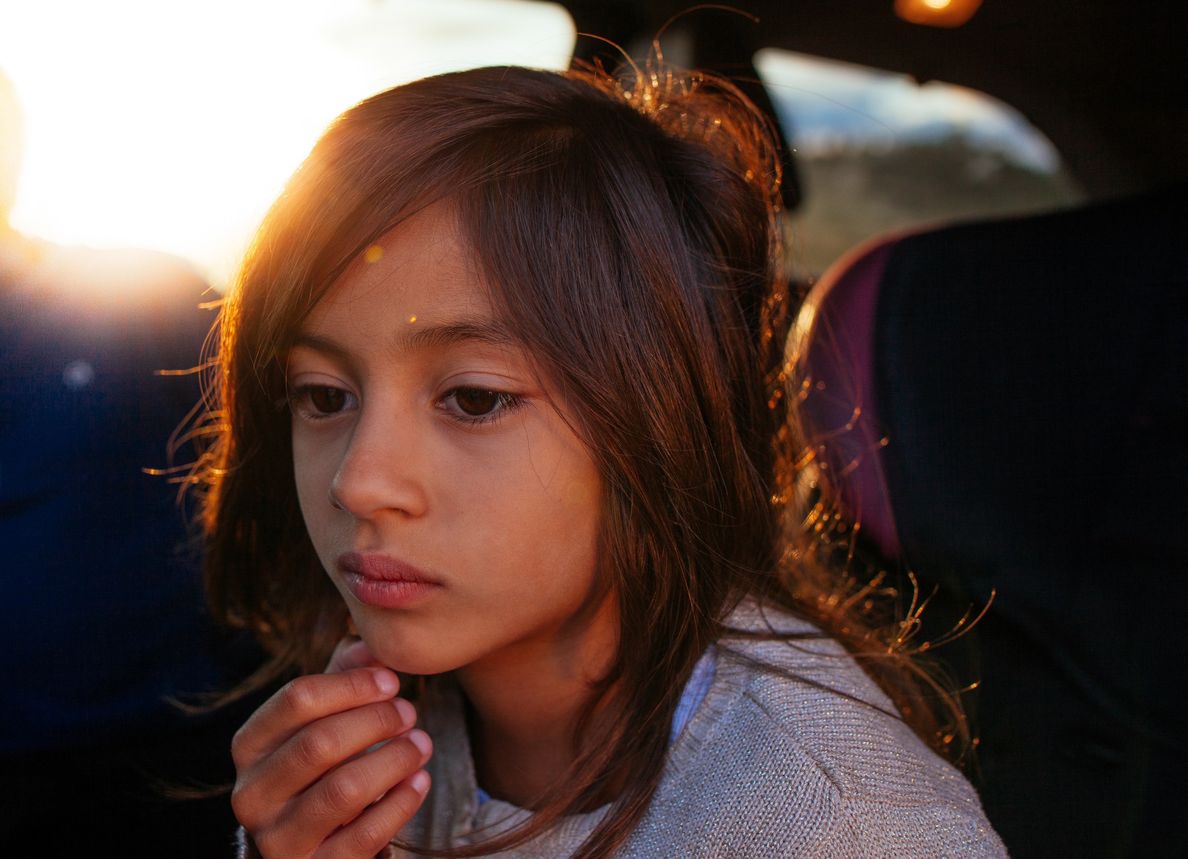 sad young child sitting in a car alone, lonely road trip 4k, HD Wallpaper