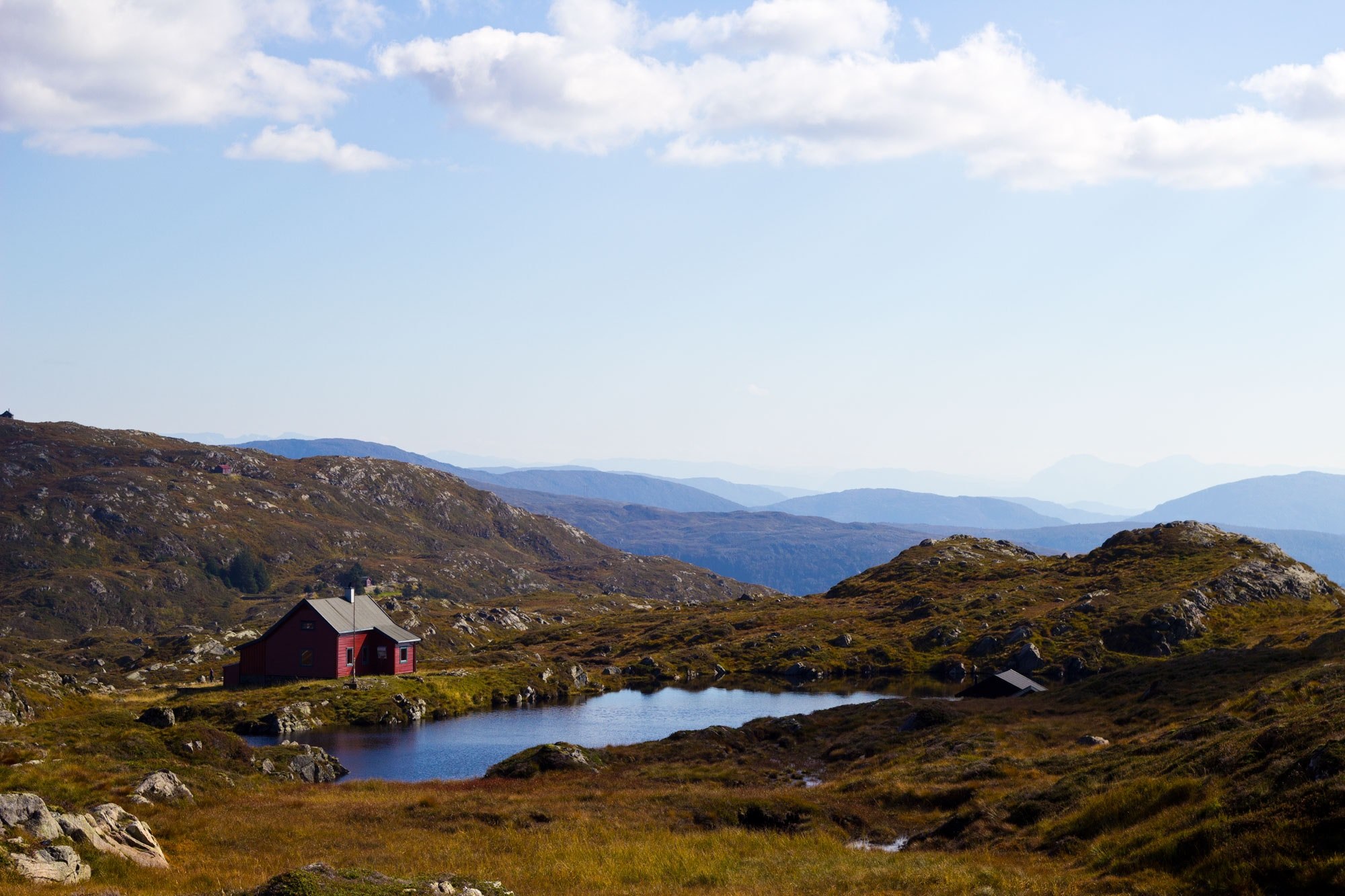 a red cabin near a small pond surrounded by rocky hills, red cabin on the fjords 4k, HD Wallpaper