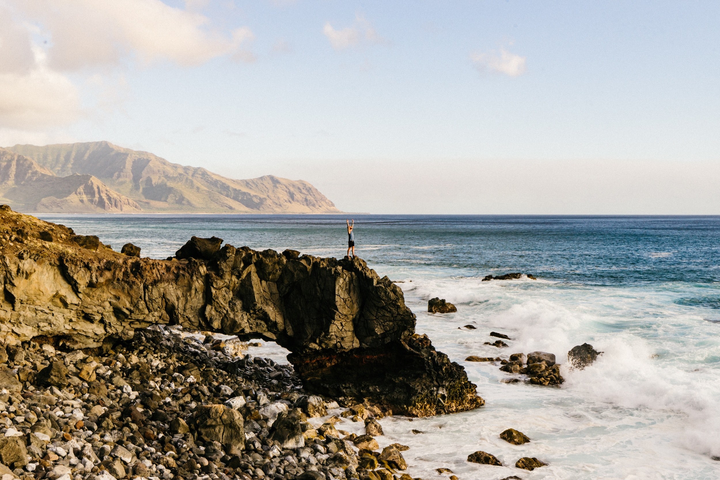a person standing on the edge of a cliff by the sea with their arms outstretched, drinking in life 4k, HD Wallpaper