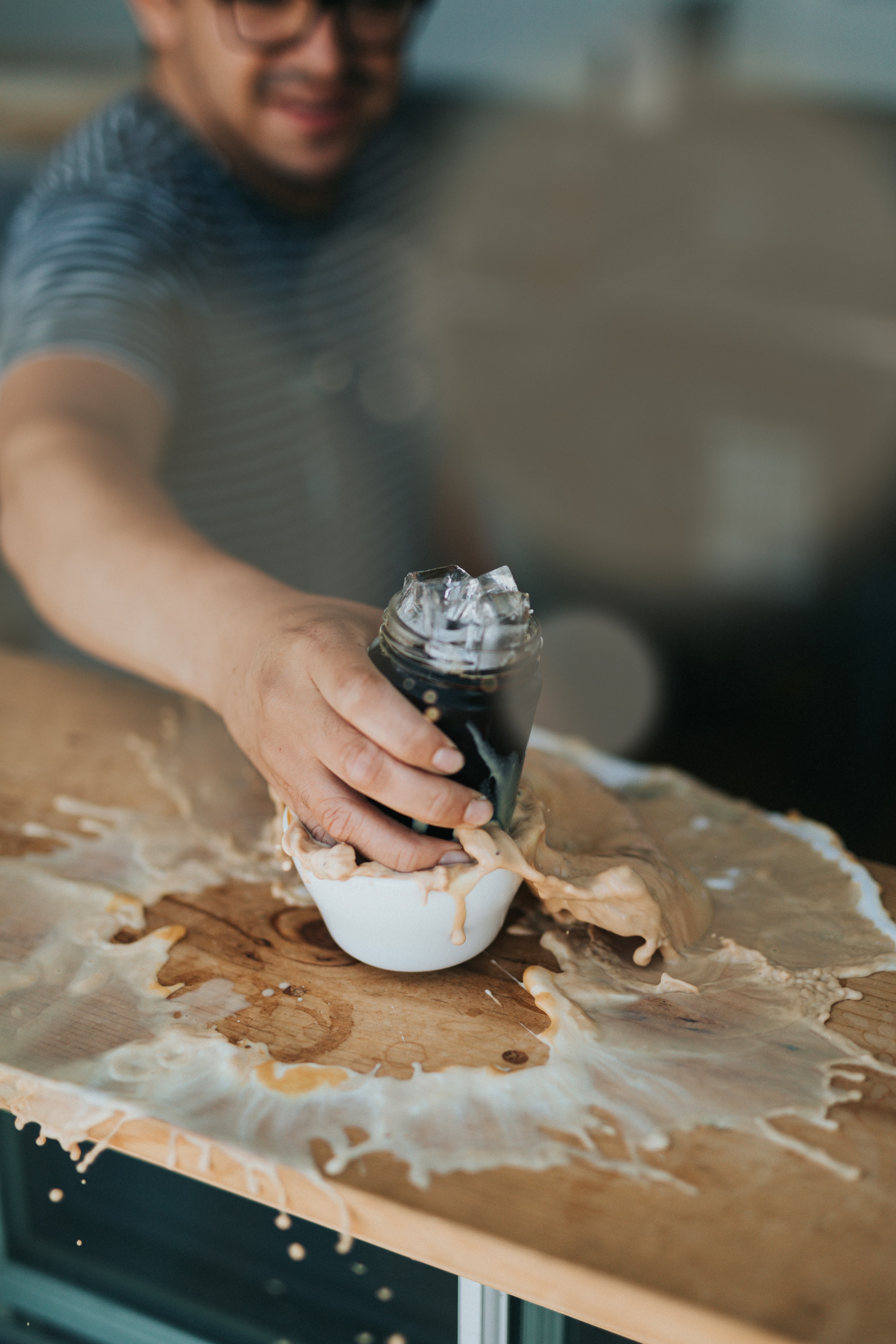a man with a beard and glasses is smashing a cup of coffee with a jar of cold brew coffee, cold brew coffee 4k, Phone HD Wallpaper