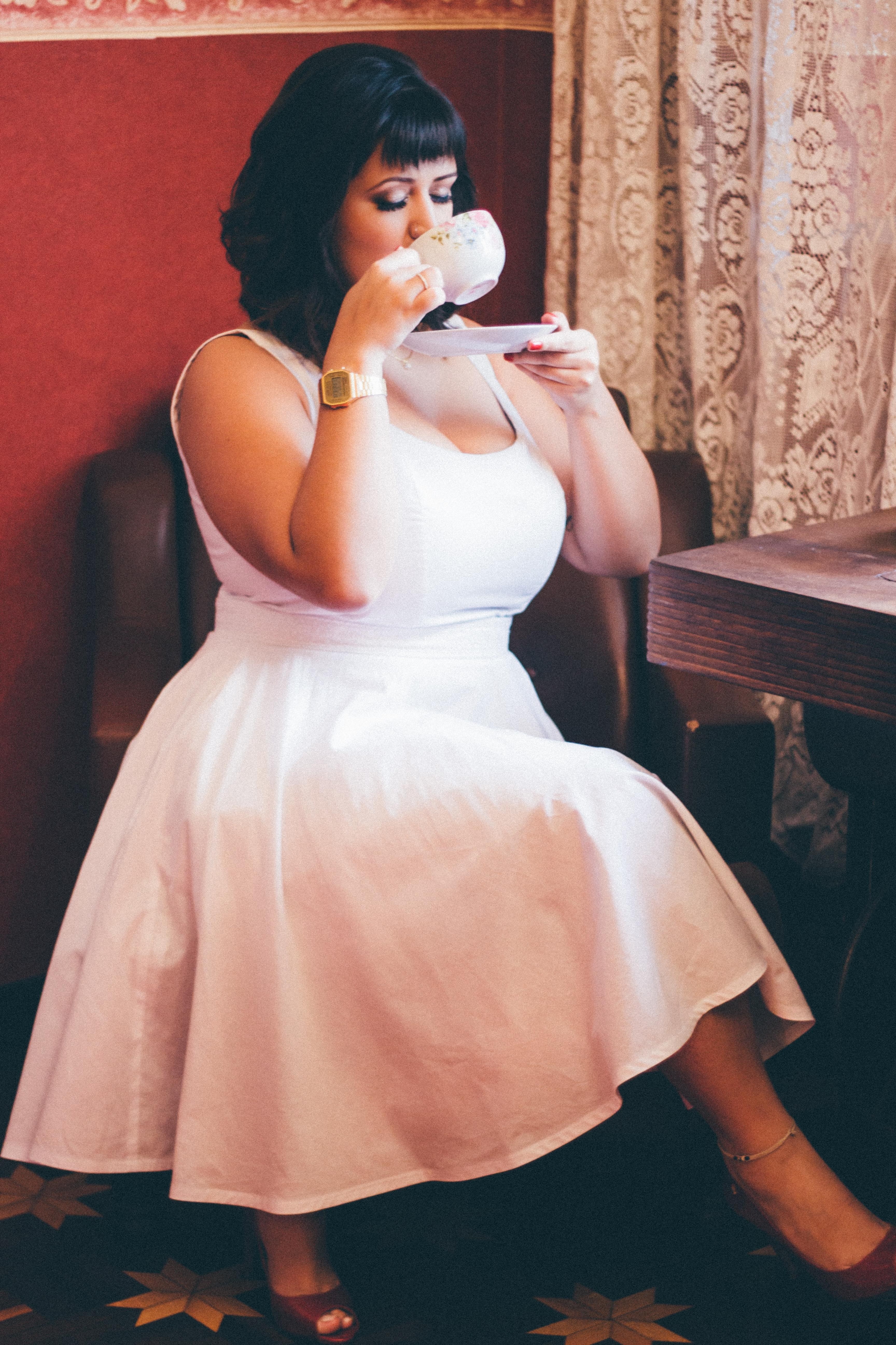 a woman sipping on a cup of tea, _sipping tea 4k, Phone HD Wallpaper