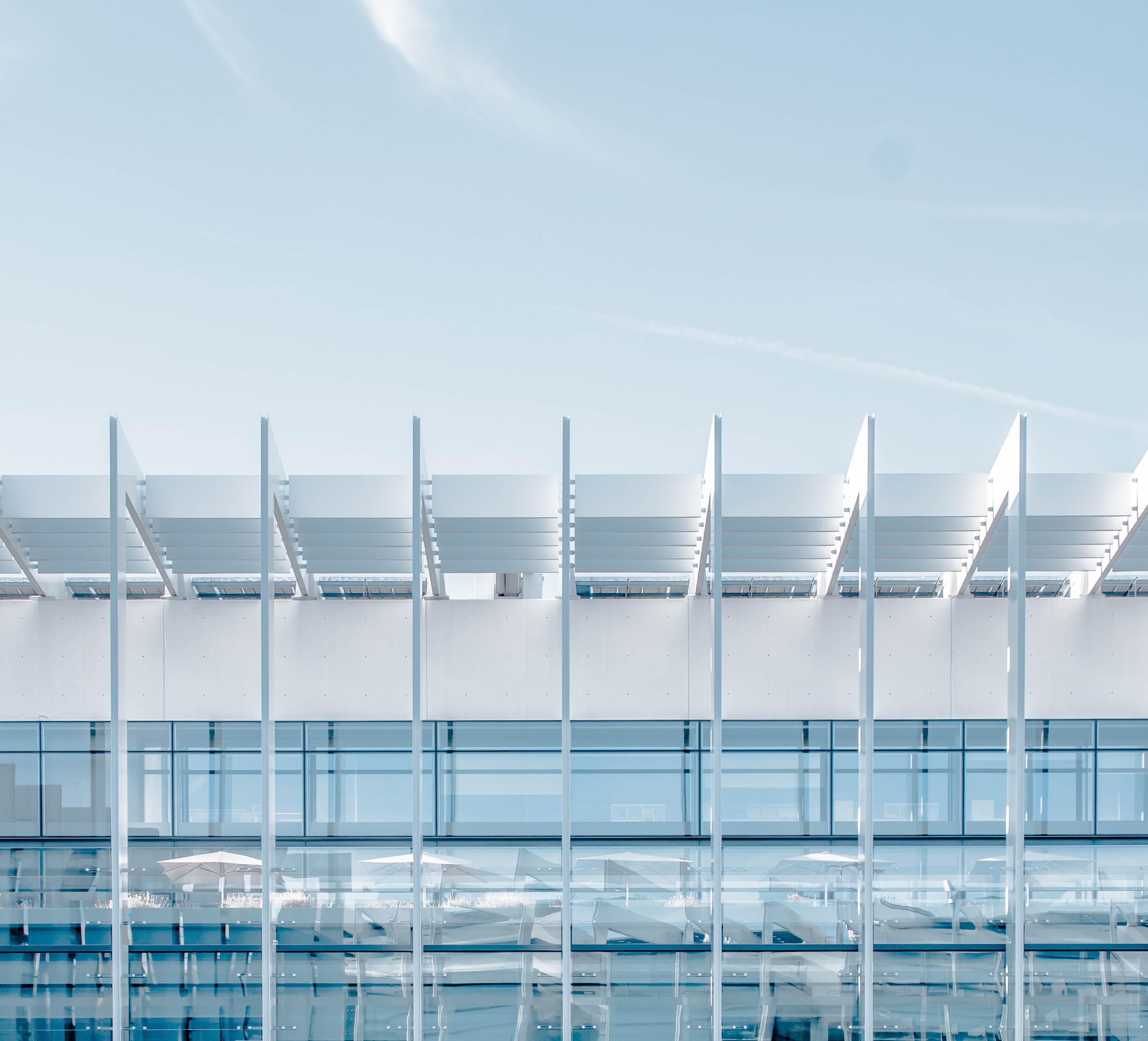 the exterior of a building with a white roof over a glass facade in madrid, white roof and glass facade 4k, HD Wallpaper